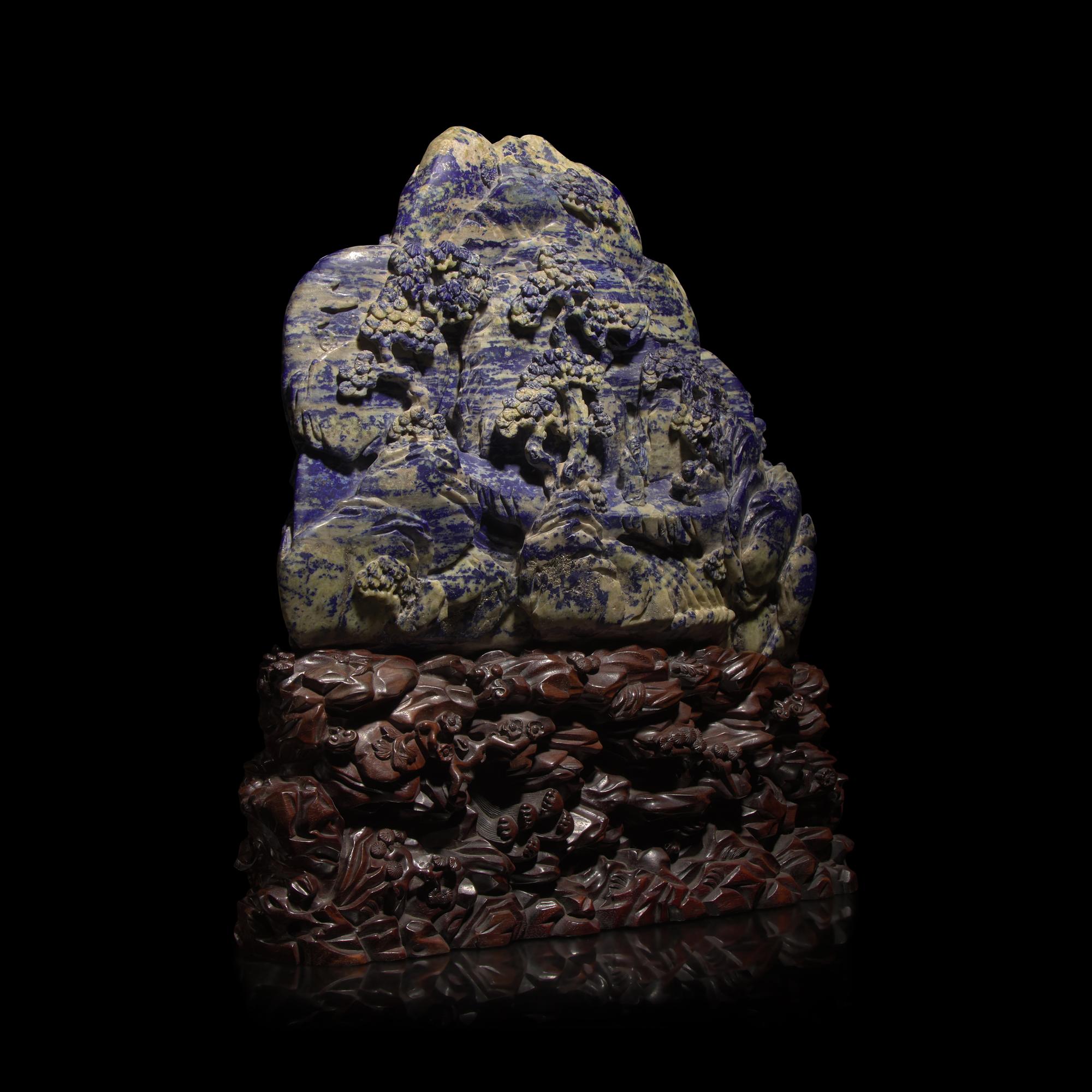 A Large Chinese Lapis Lazuli 'Eight Immortals Crossing the River' Boulder, Qing Dynasty — 清 青金石雕羅漢渡江山子