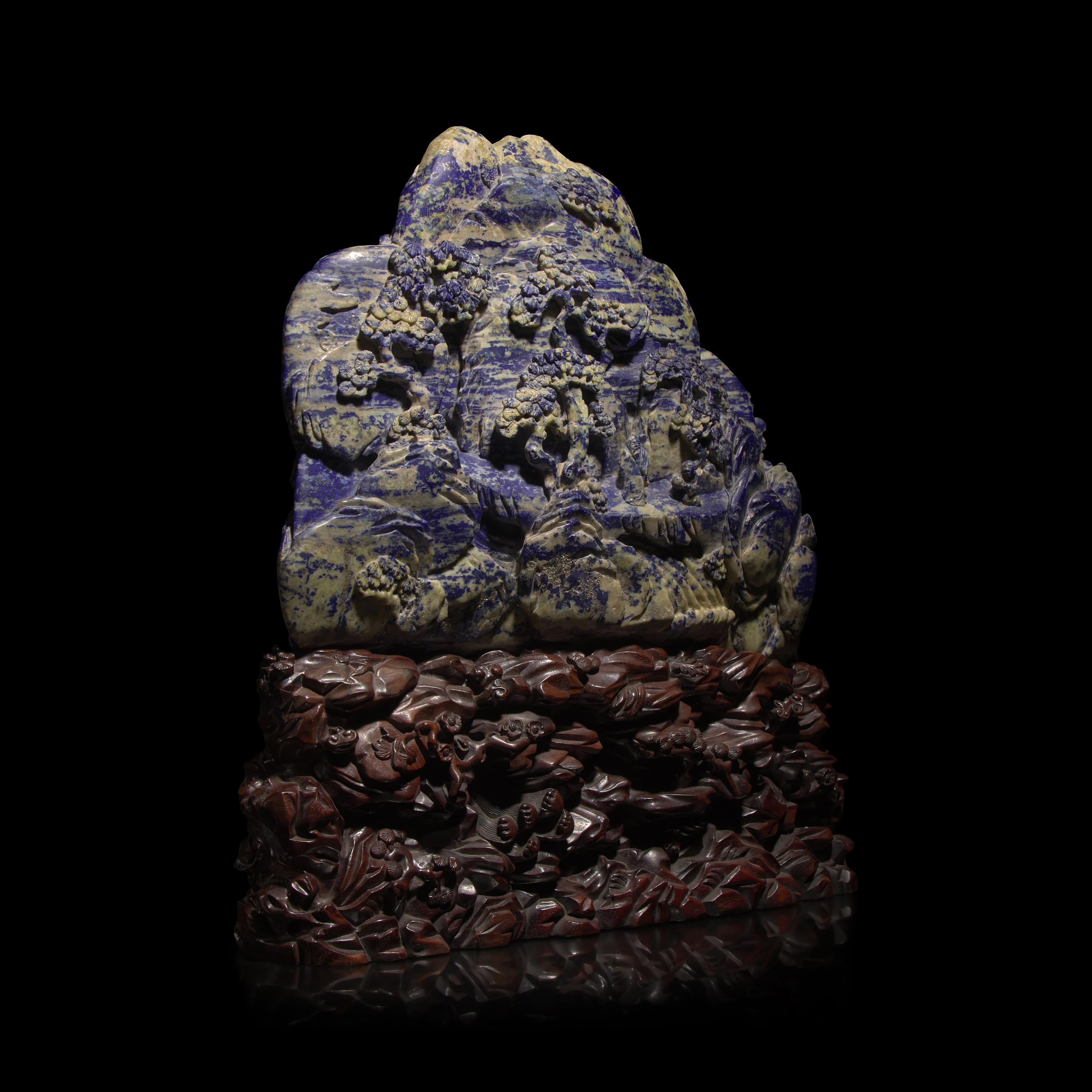 A Large Chinese Lapis Lazuli 'Eight Immortals Crossing the River' Boulder, Qing Dynasty — 清 青金石雕羅漢渡江山子