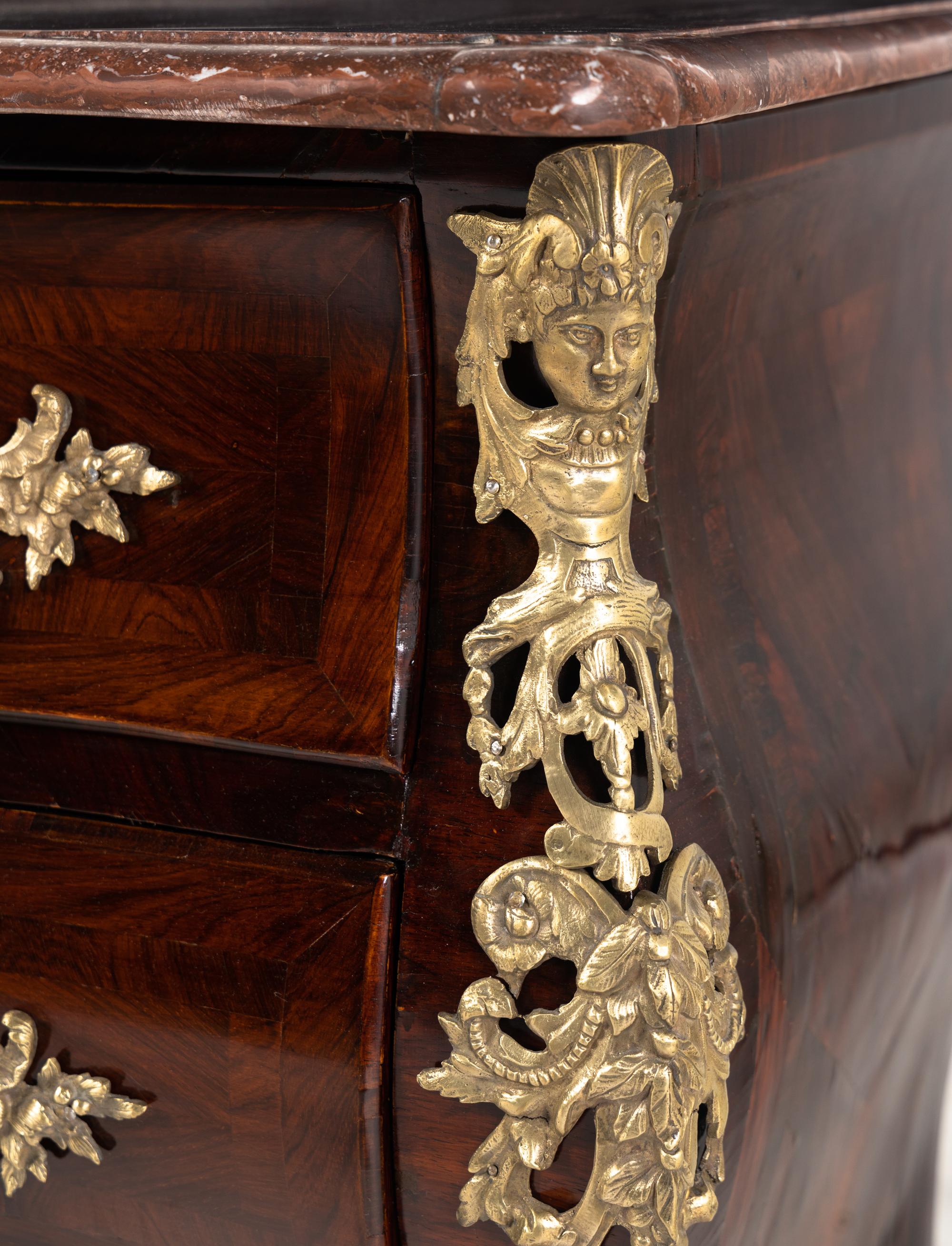 A Régence Style Gilt-Bronze Mounted Kingwood and Tulipwood Commode