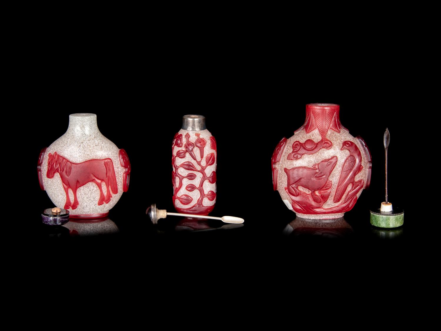 Three Chinese Red Overlay Snow Flake Ground Peking Glass Snuff Bottles