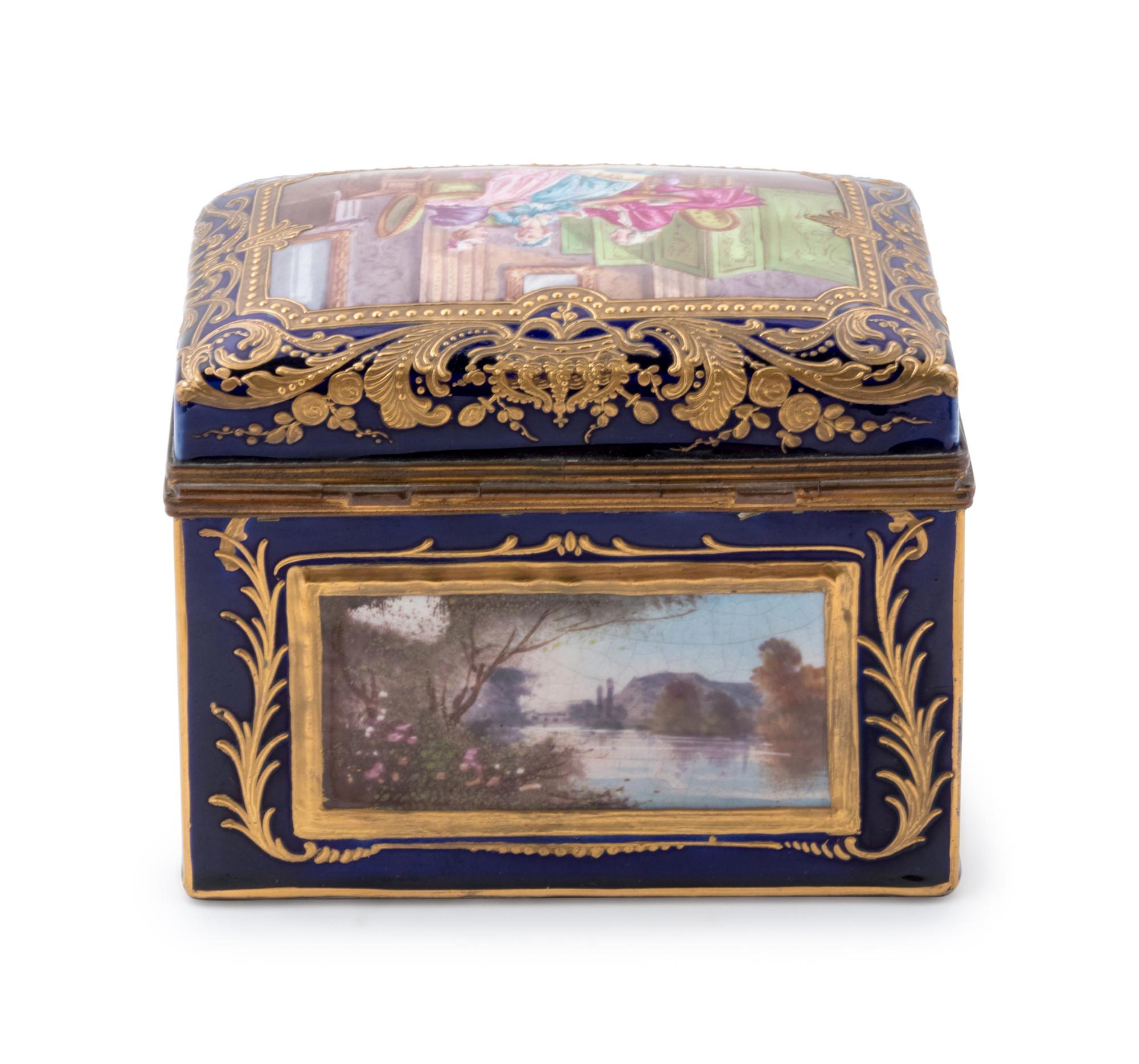 A Sèvres Style Painted and Parcel Gilt Porcelain Table Casket