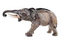 A Royal Doulton Porcelain Model of an Elephant Width 23 inches. — MODELED BY CHARLES JOHN NOKE, CIRCA 1930