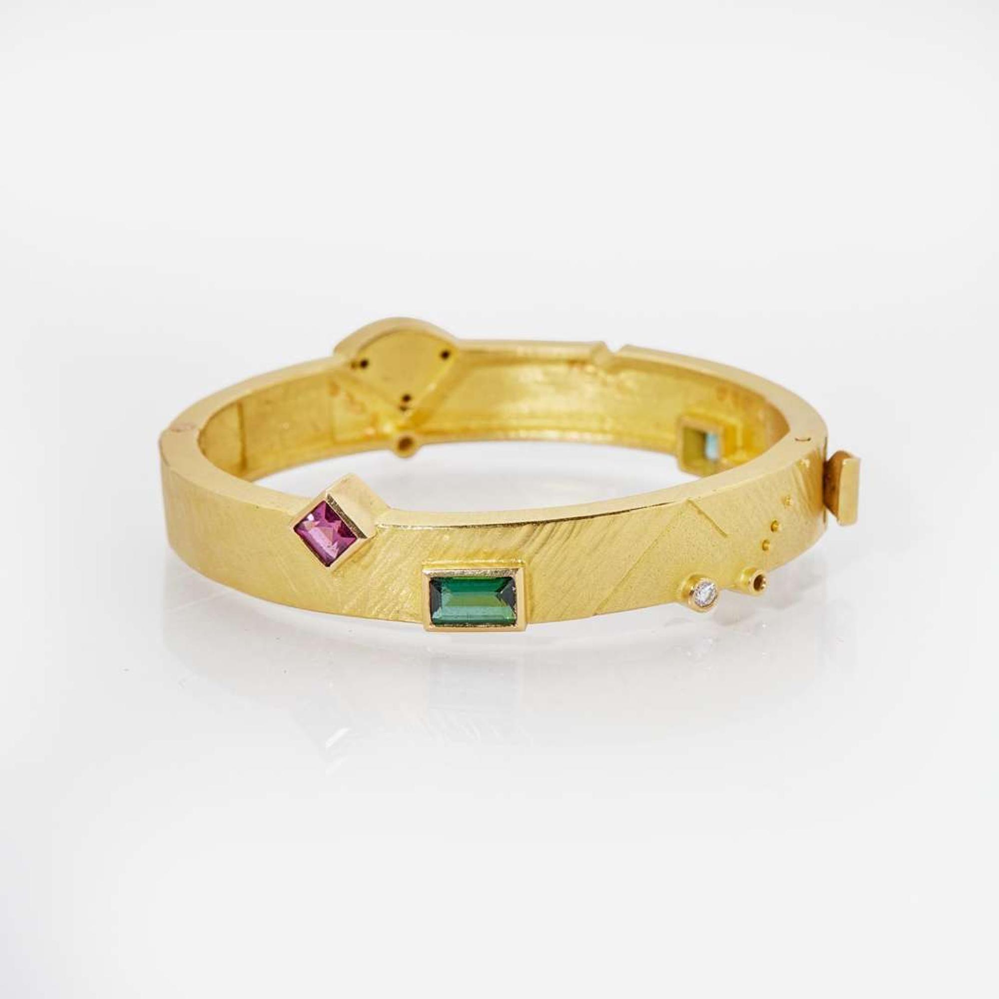 A Dan Alsberg 18K Yellow Gold and Gemstone Bangle