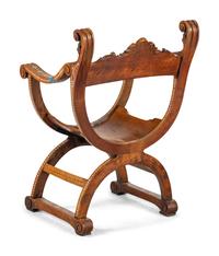 A North Italian Carved Walnut and Bone-Inlaid Savonarola Chair
