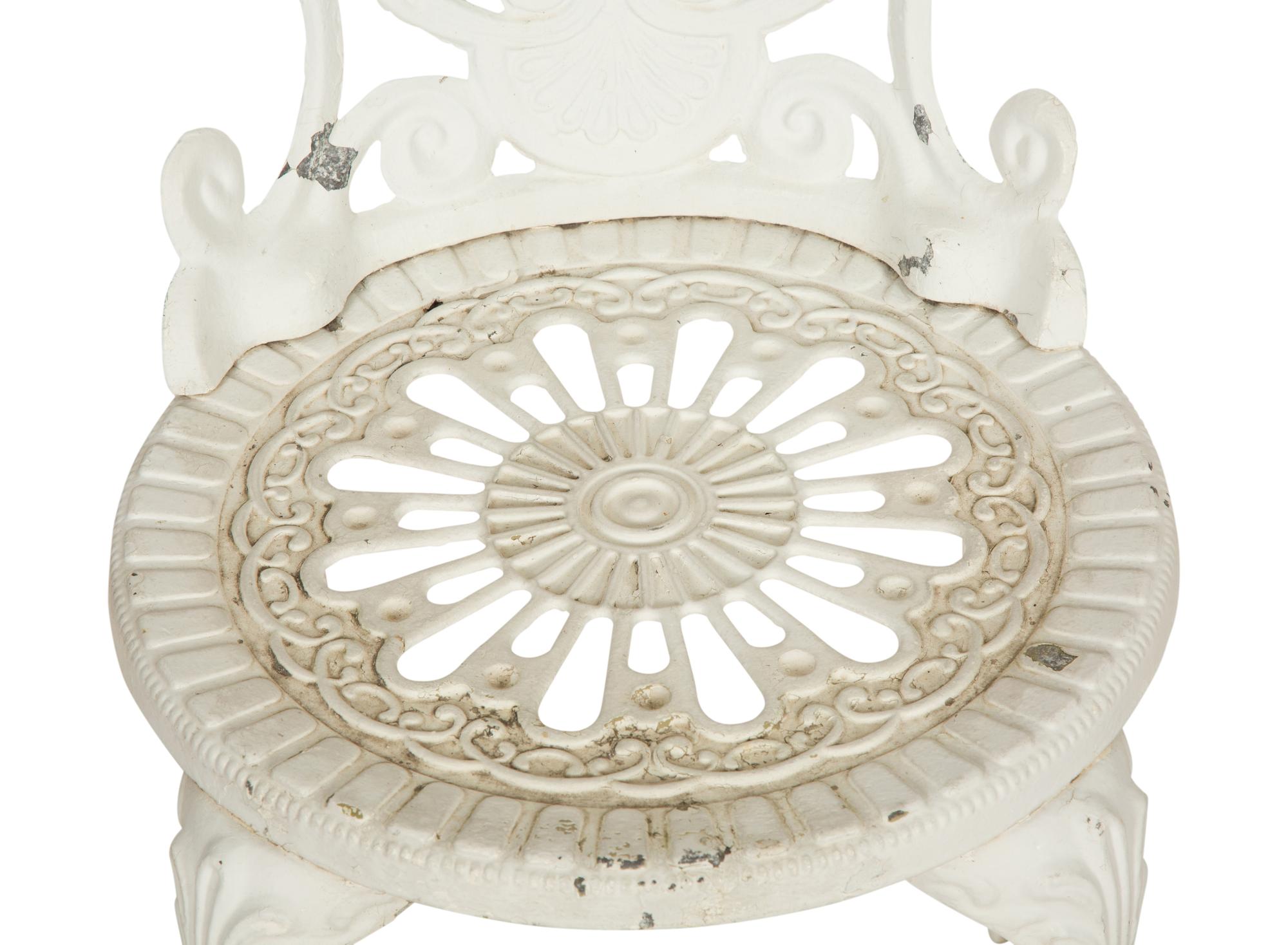 A Pair of White Painted Cast Metal Garden Chairs