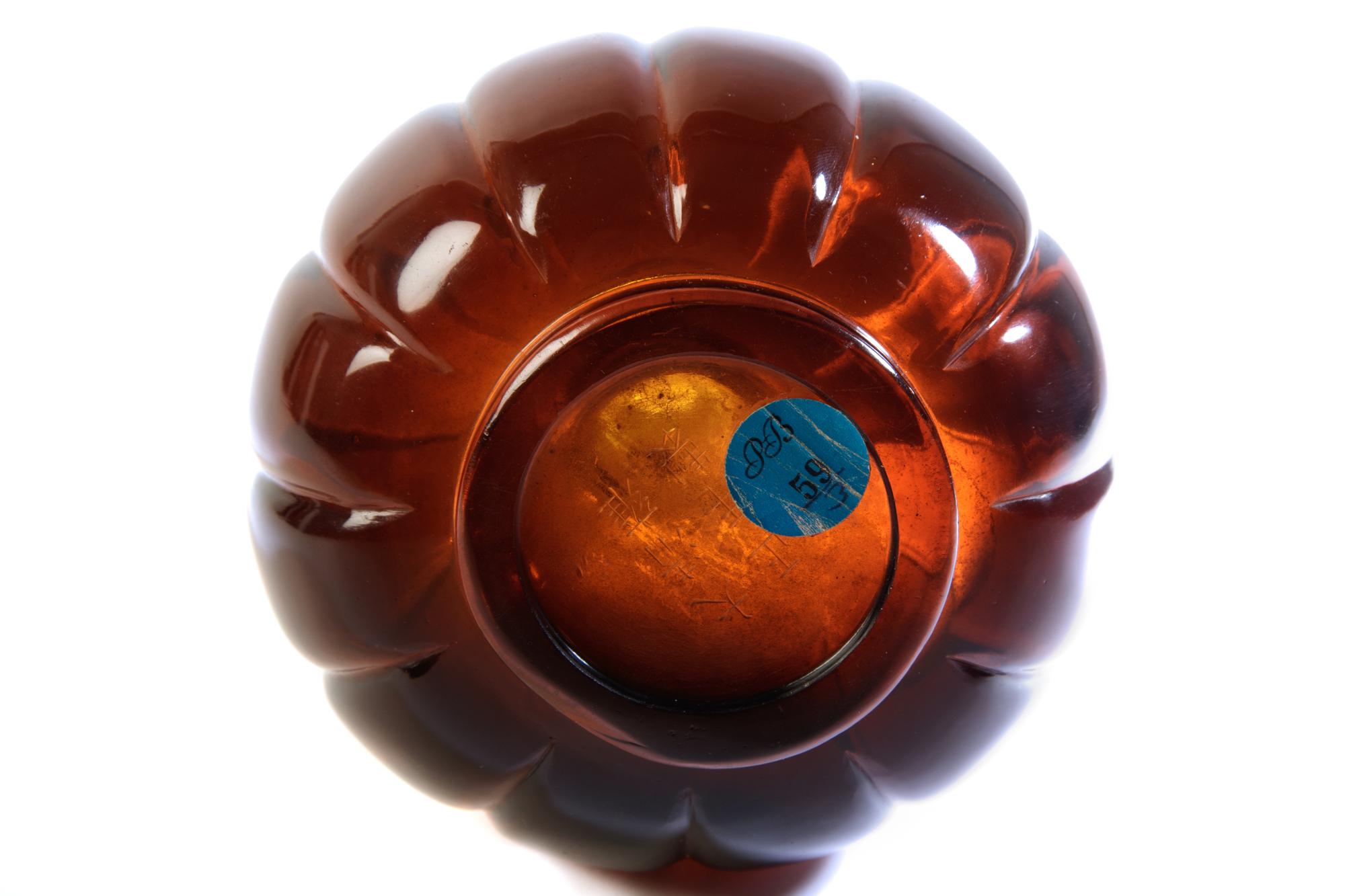 A Transparent Amber-Tone Glass Bottle