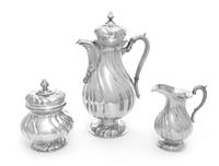 A German Silver Three-Piece Coffee Service, M. H. Wilkens & Sohne, Bremen-Hemelingen, each having a baluster form body with twist decor