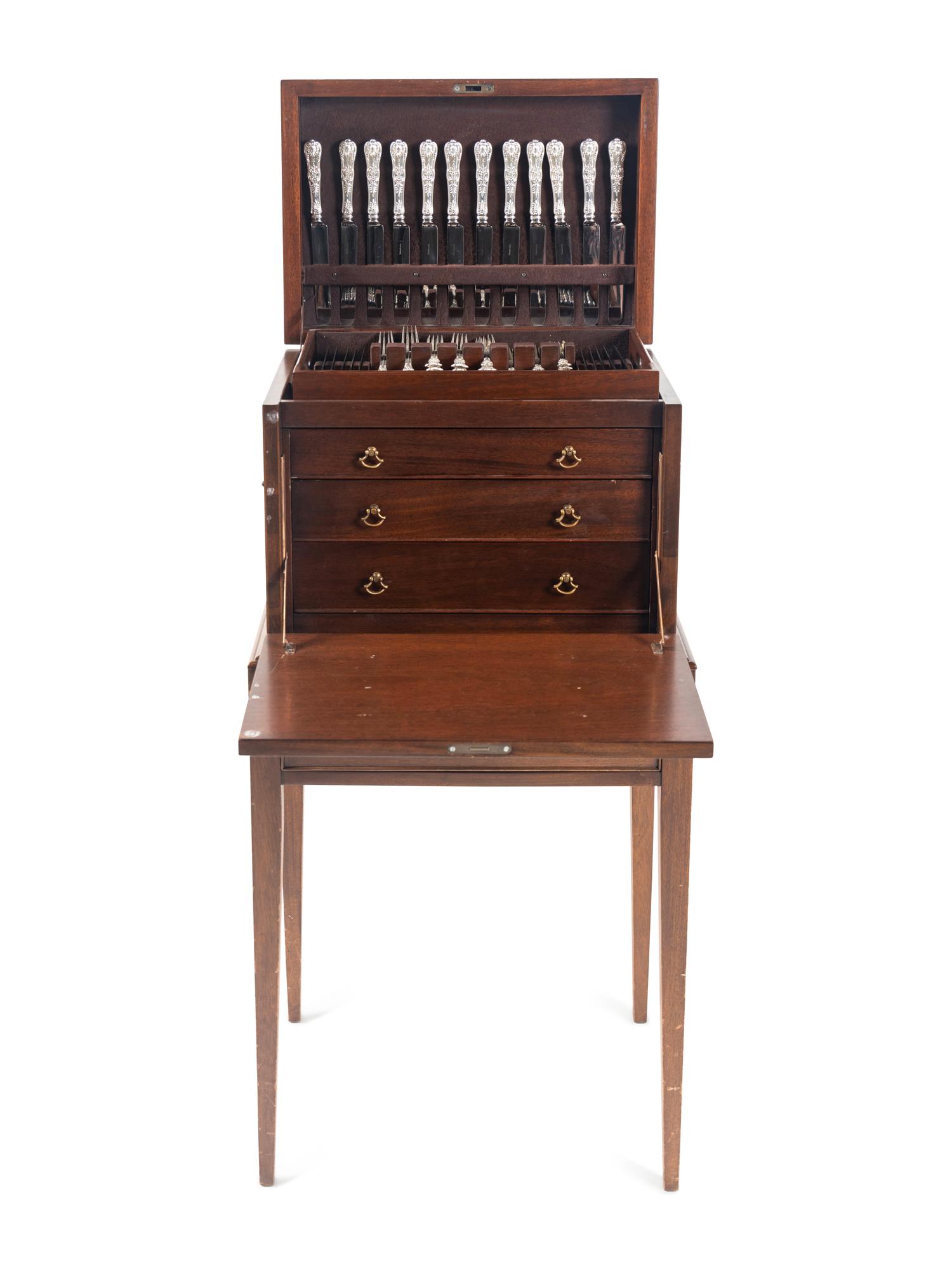 A Tiffany and Co. English King Silver Flatware Service in a Fitted Mahogany Chest