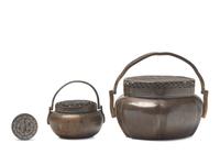 Two Chinese Copper Hand Warmers and A Small Bronze Mirror