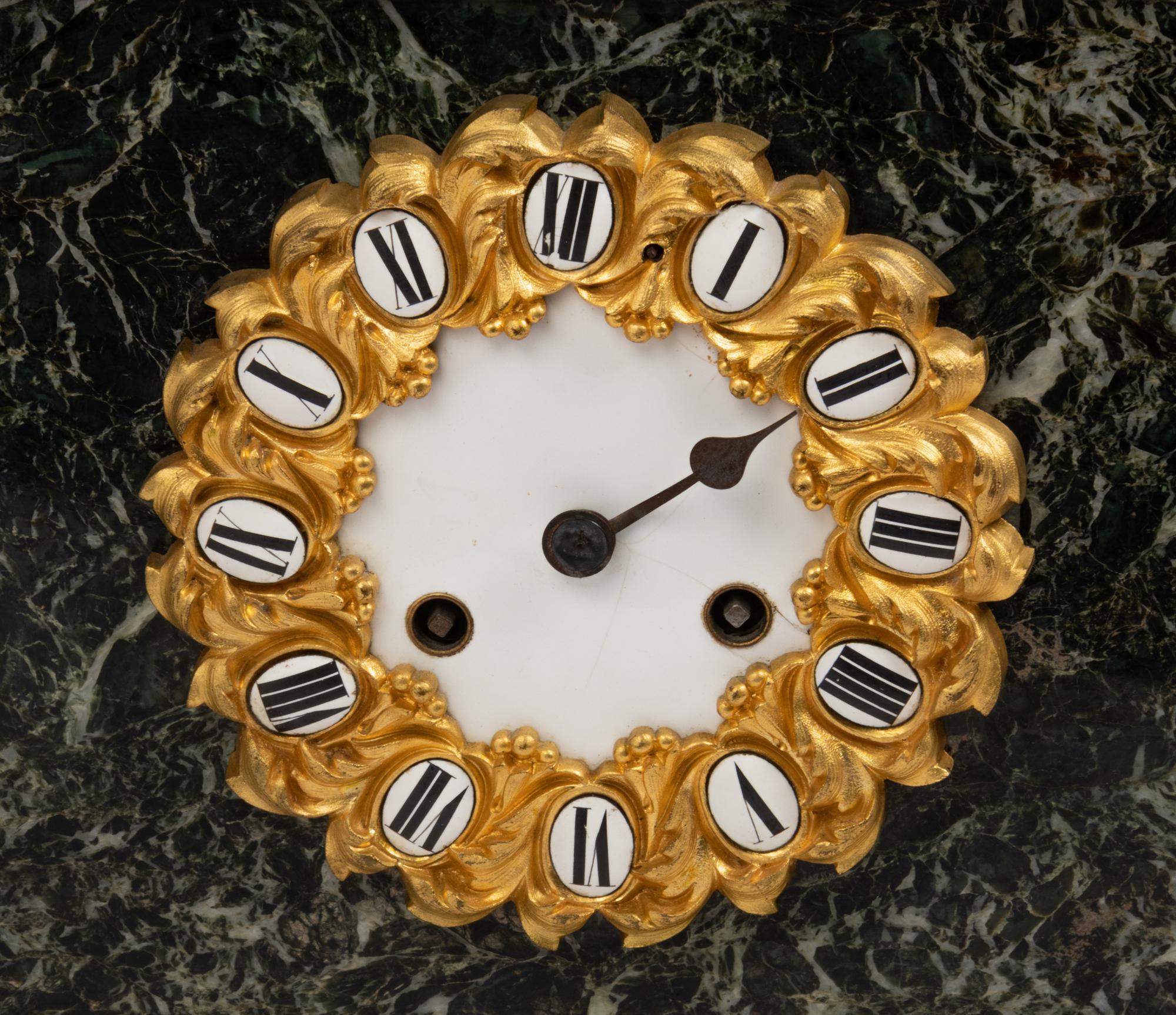An Assembled Louis Philippe Marble and Gilt Bronze Figural Garniture