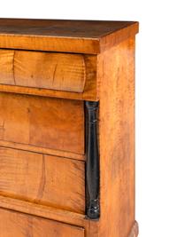 A Biedermeier Maple Chest of Drawers