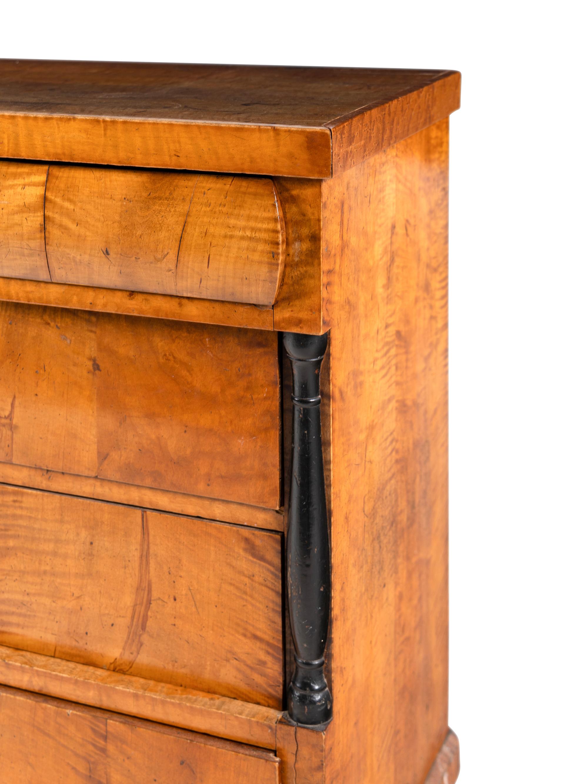 A Biedermeier Maple Chest of Drawers