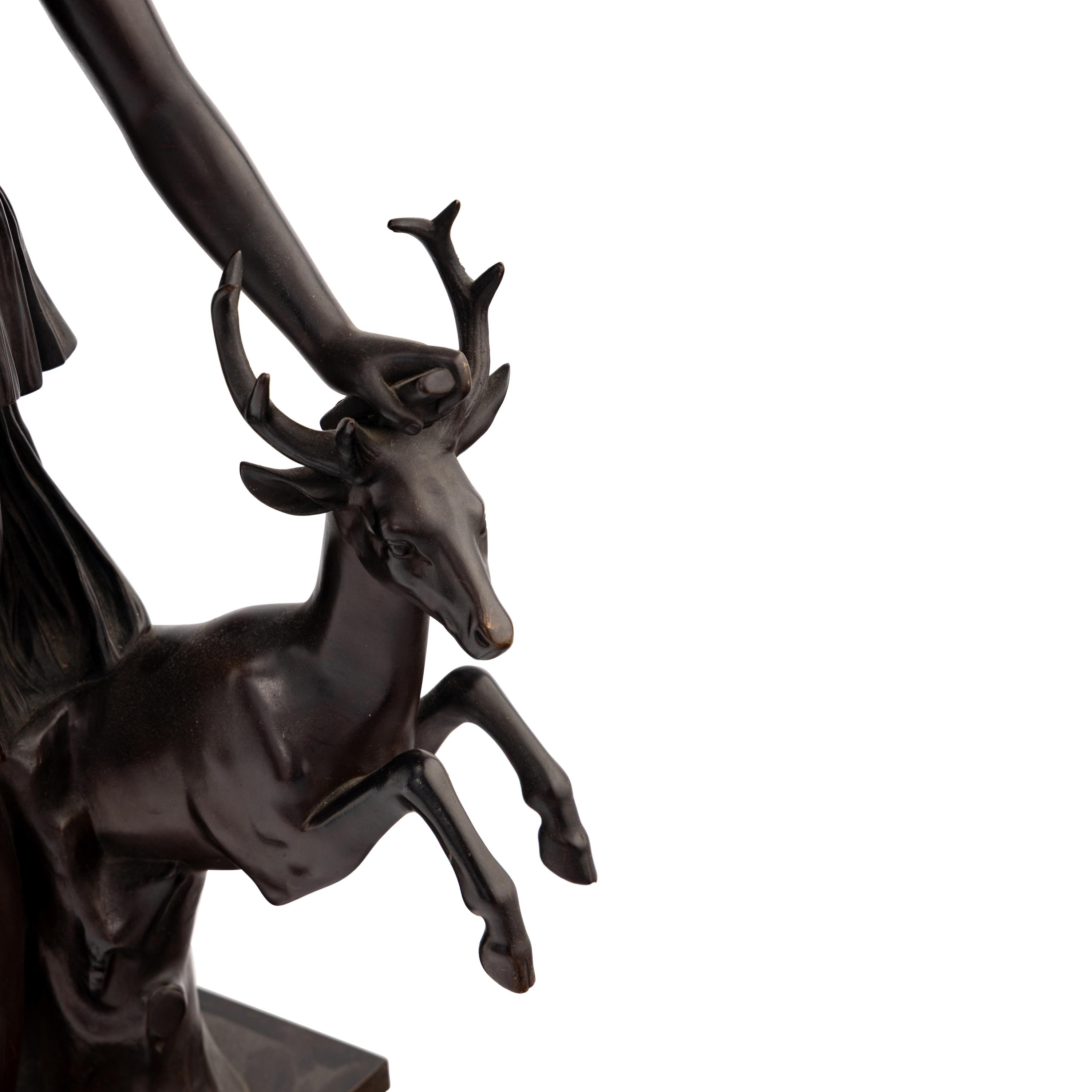 A French Patinated Bronze Figure of Diana of Versailles