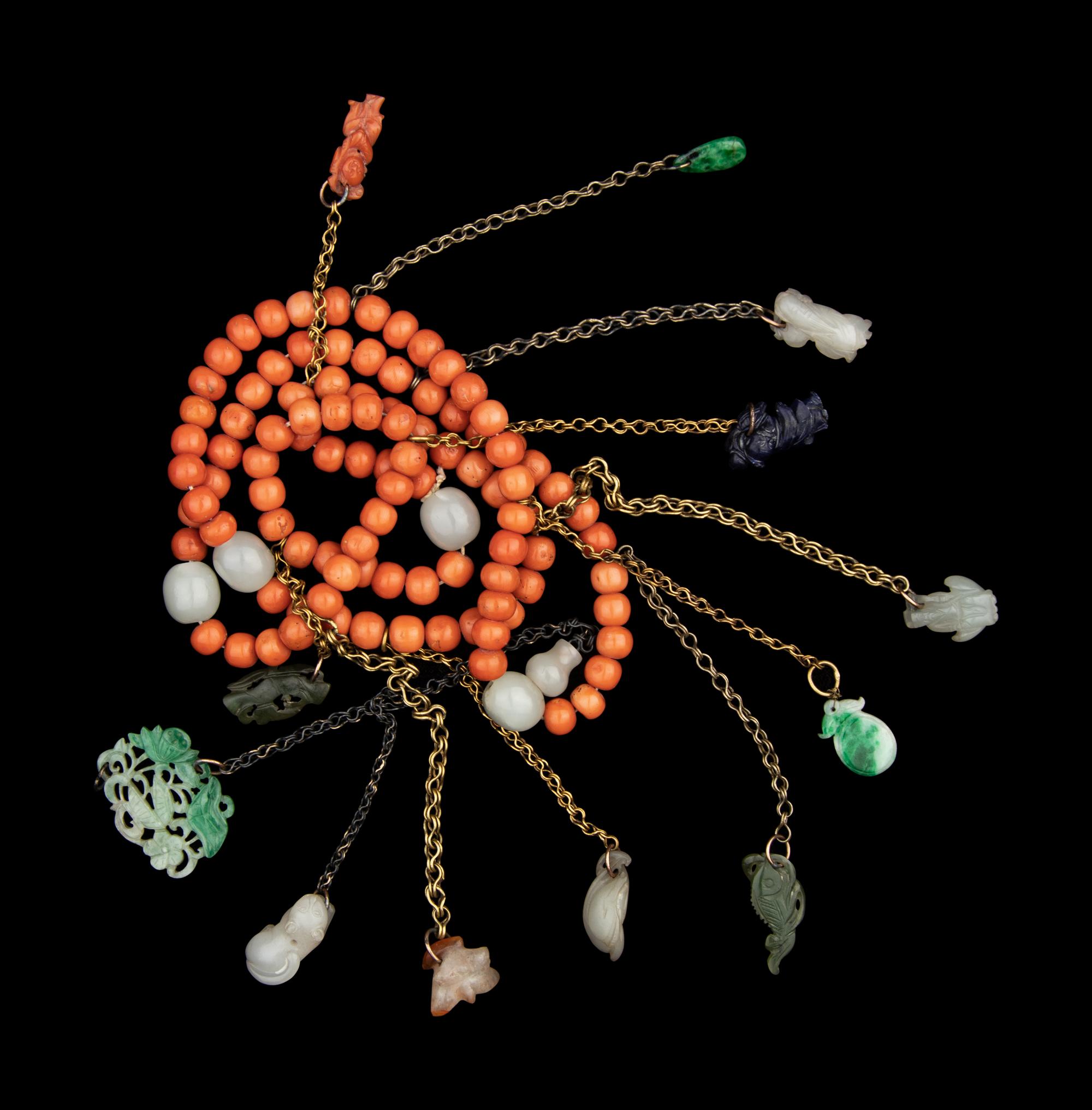 A Chinese Coral, Jade, Jadiete and Hardstone Necklace