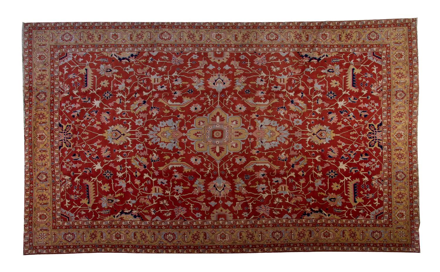 A Heriz Style Wool Rug, 14 feet 2 inches x 9 feet 11 inches.