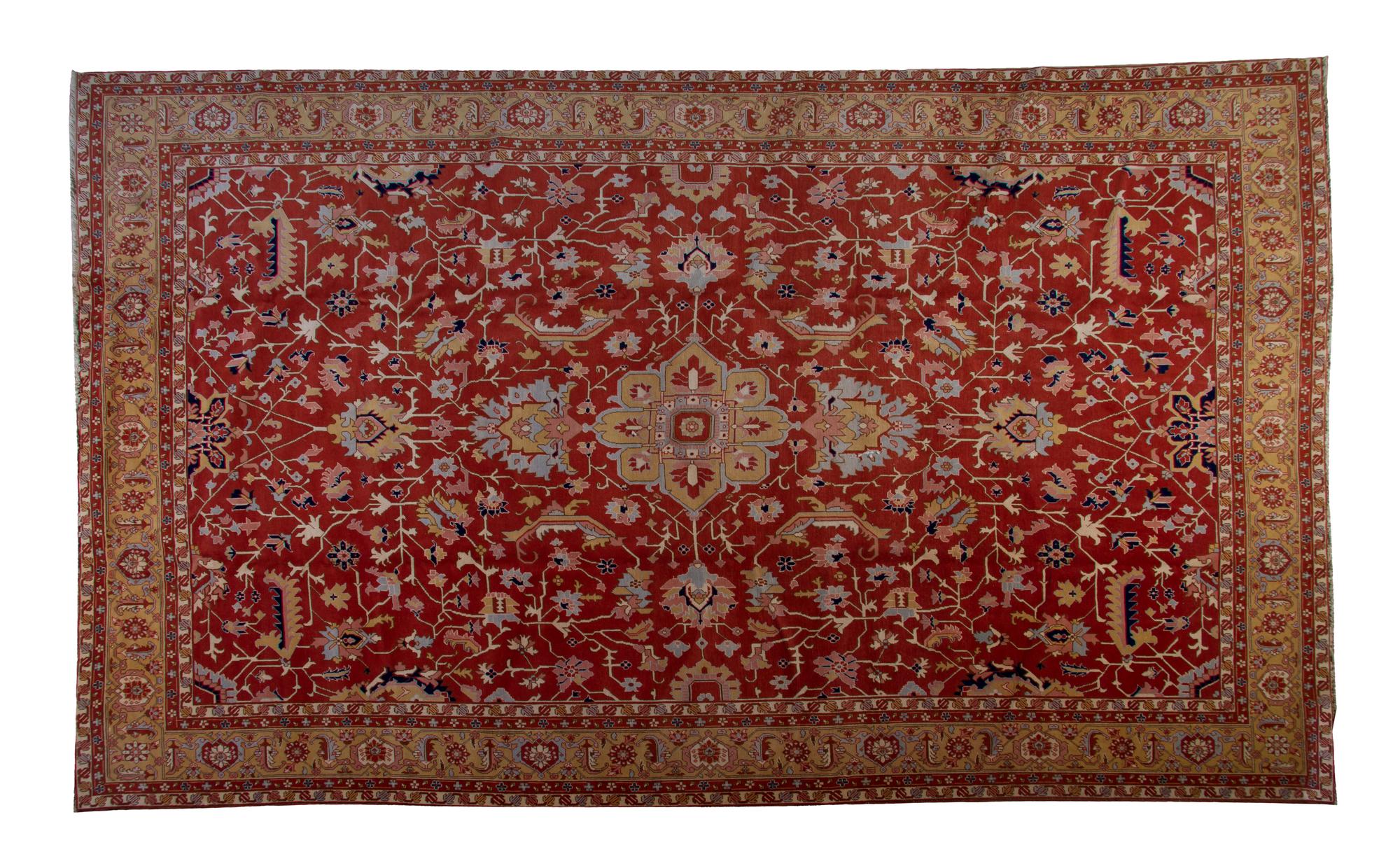 A Heriz Style Wool Rug, 14 feet 2 inches x 9 feet 11 inches.