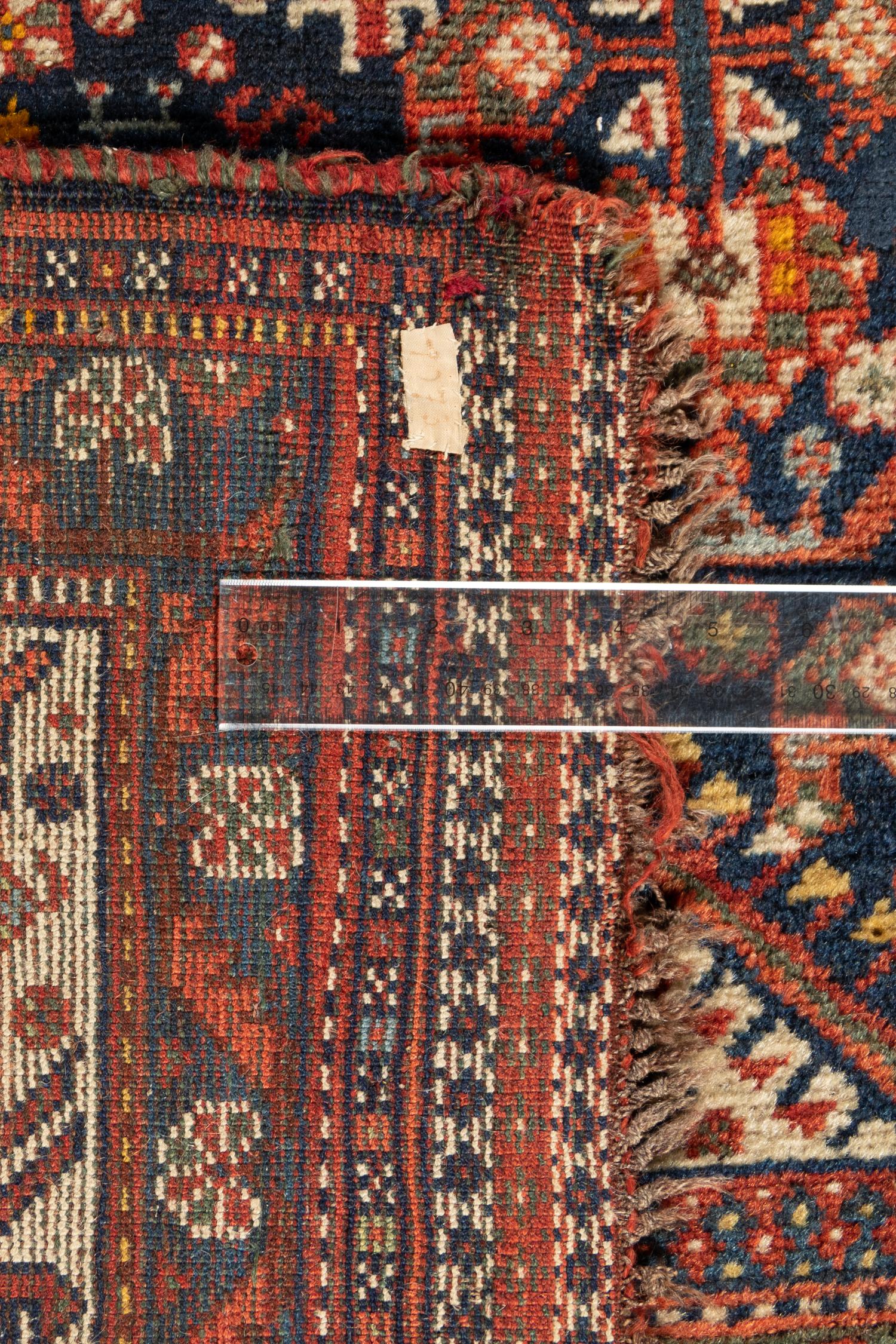 A Persian Wool Rug