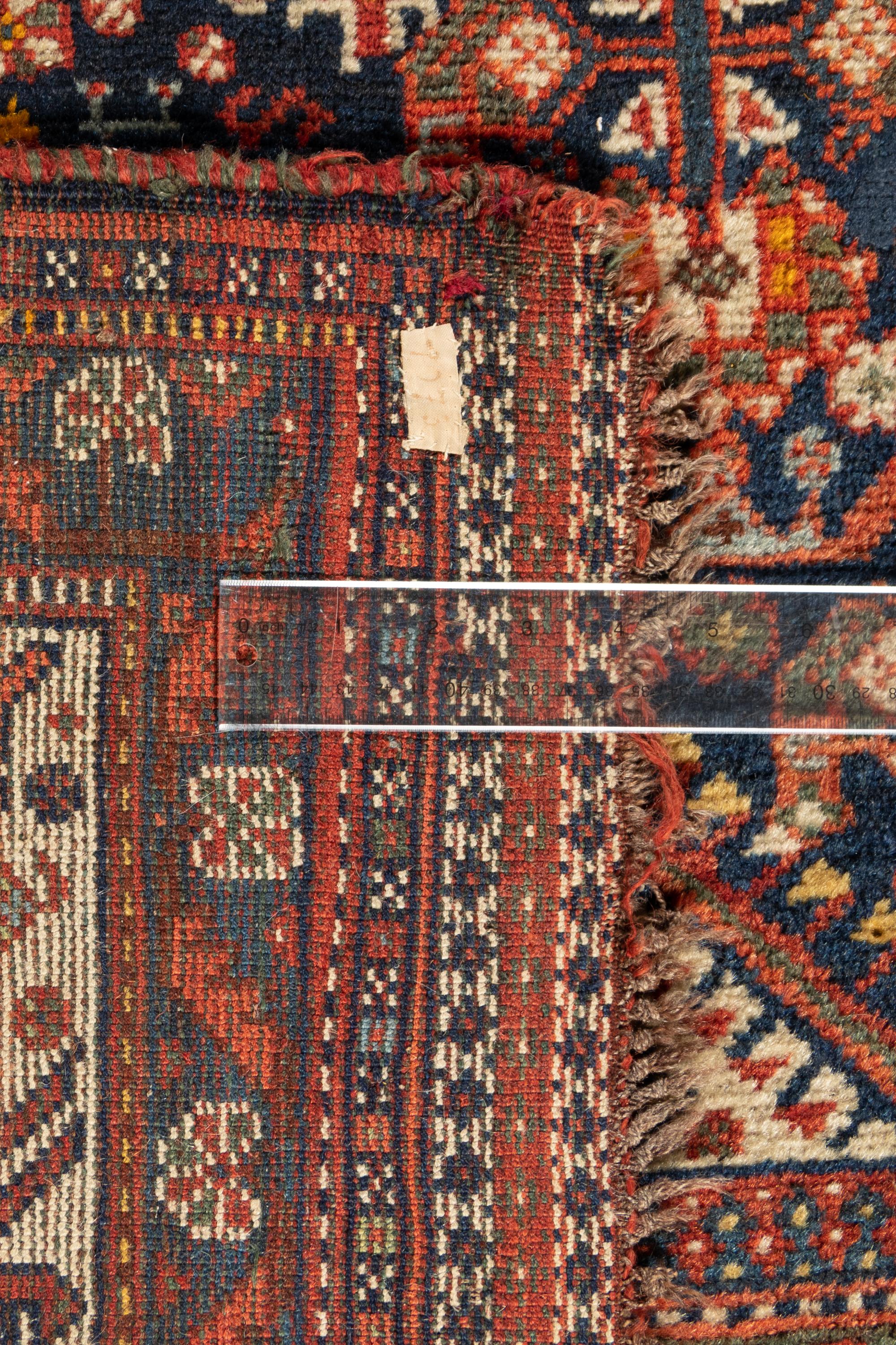 A Persian Wool Rug