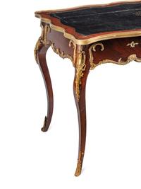 A Louis XV Style Gilt Bronze Mounted Kingwood Bureau Plat