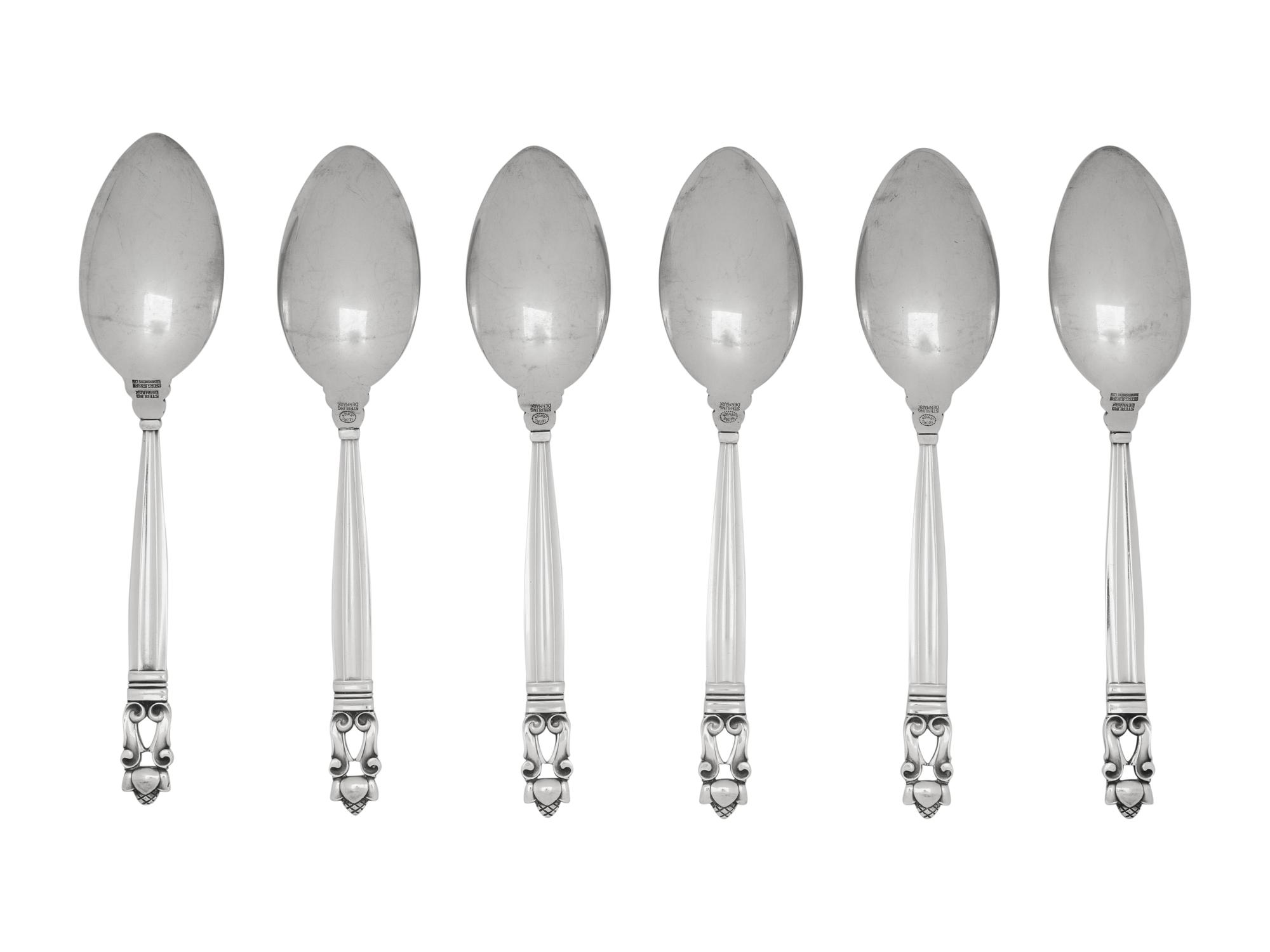 A Set of Six Georg Jensen Acorn Silver Dessert Spoons