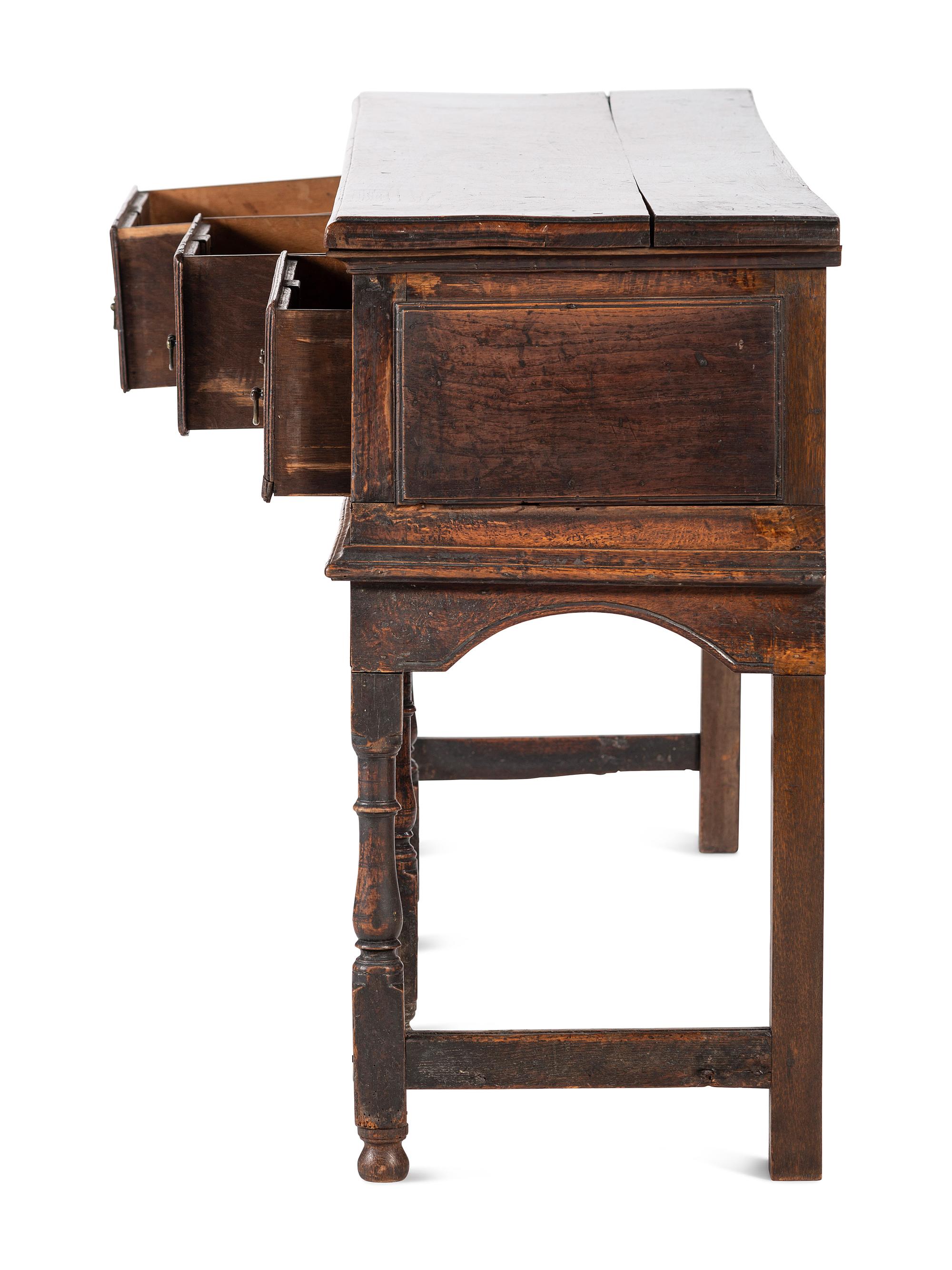 A Welsh Paneled and Turned Oak Sideboard
