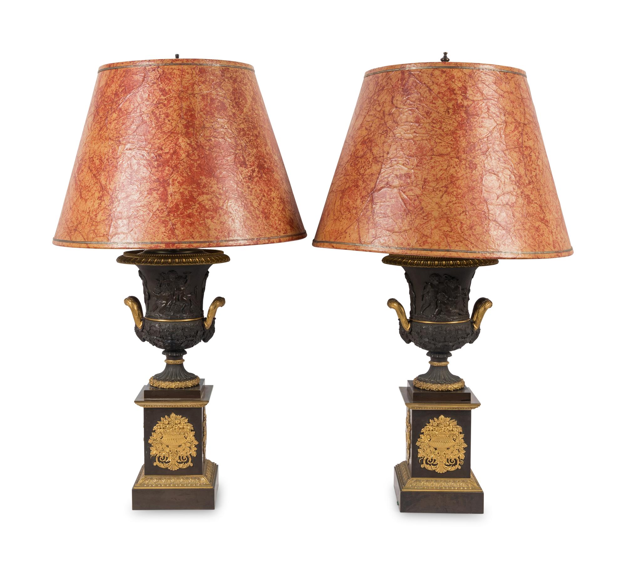 A Pair of Louis Phillippe Parcel-Gilt and Patinated Bronze Urns Mounted as Lamps