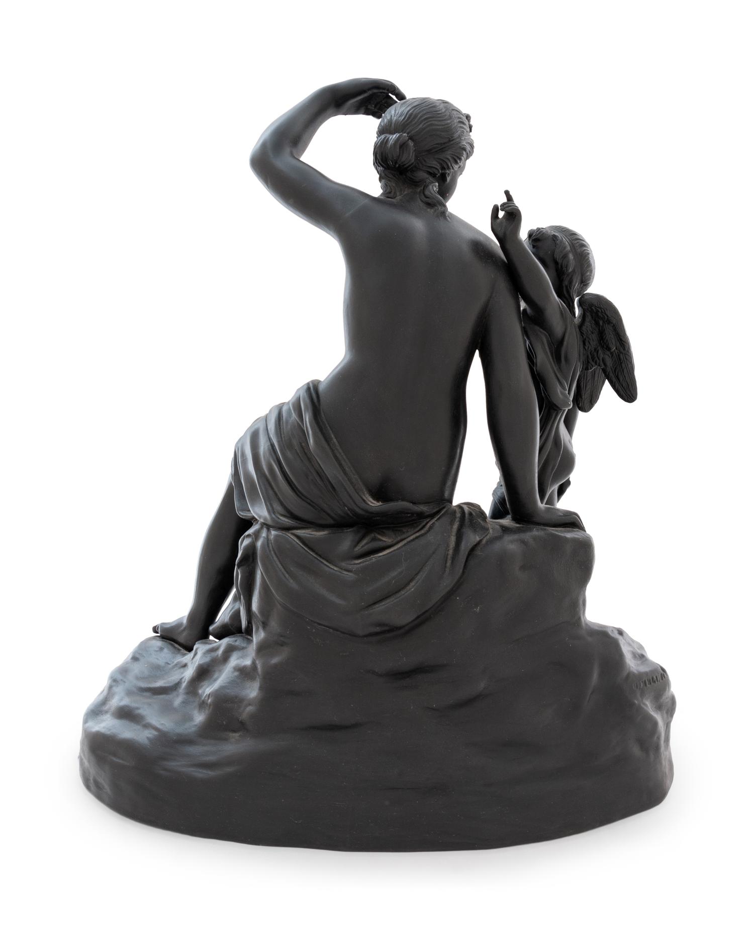 A Wedgwood Black Basalt Figural Group Depicting Cupid Disarmed