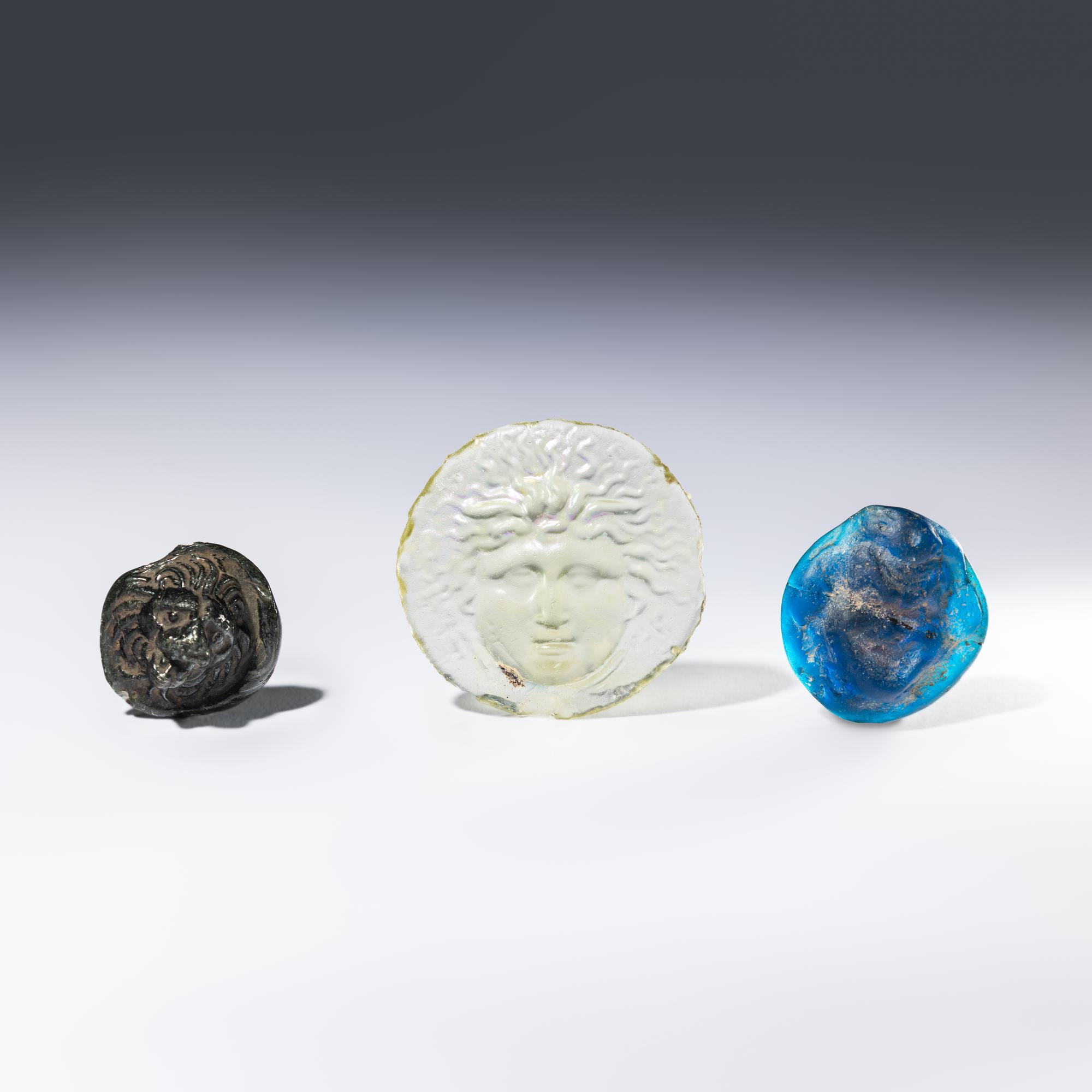 Three Roman Glass Relief Medallions