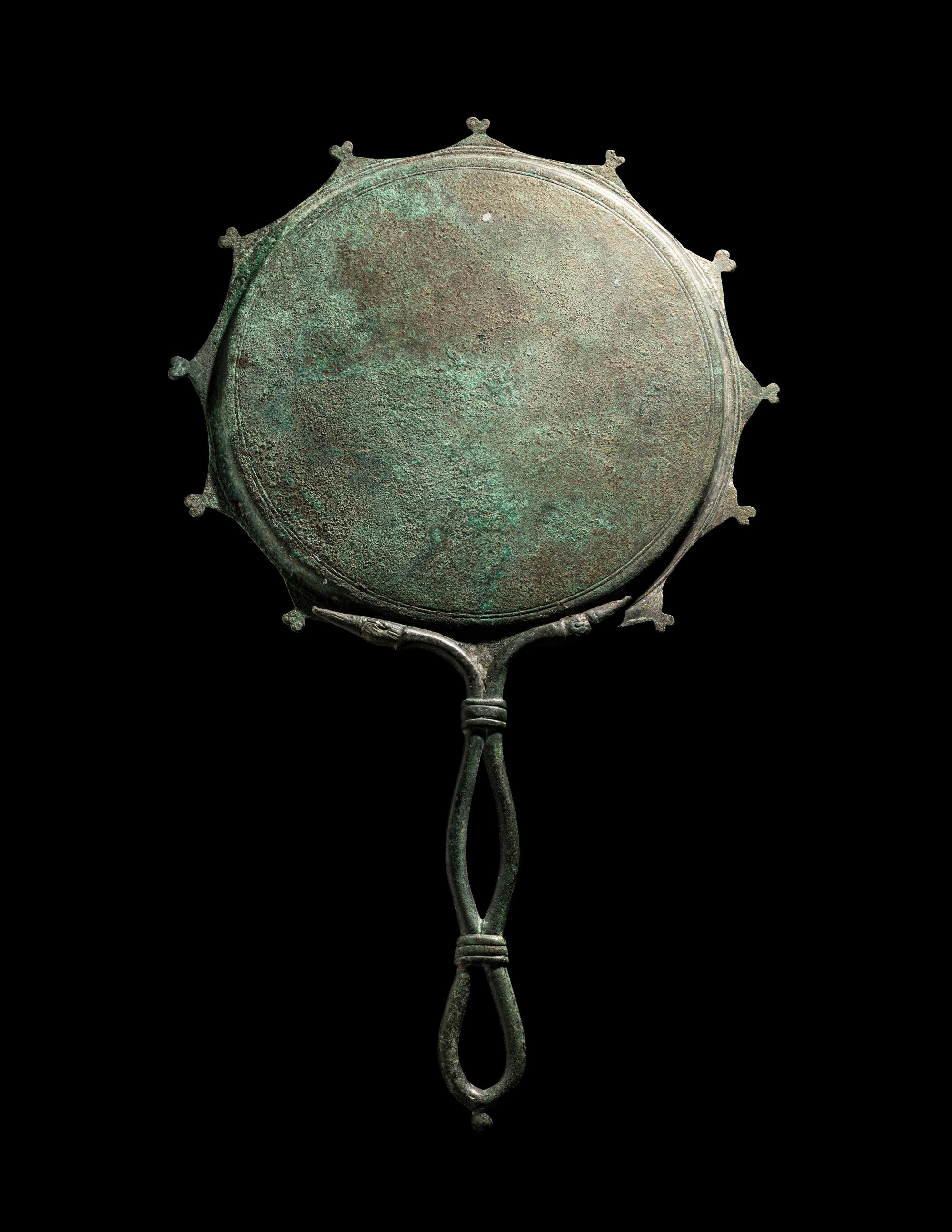 A Roman Bronze and Silver Mirror with Two Women
