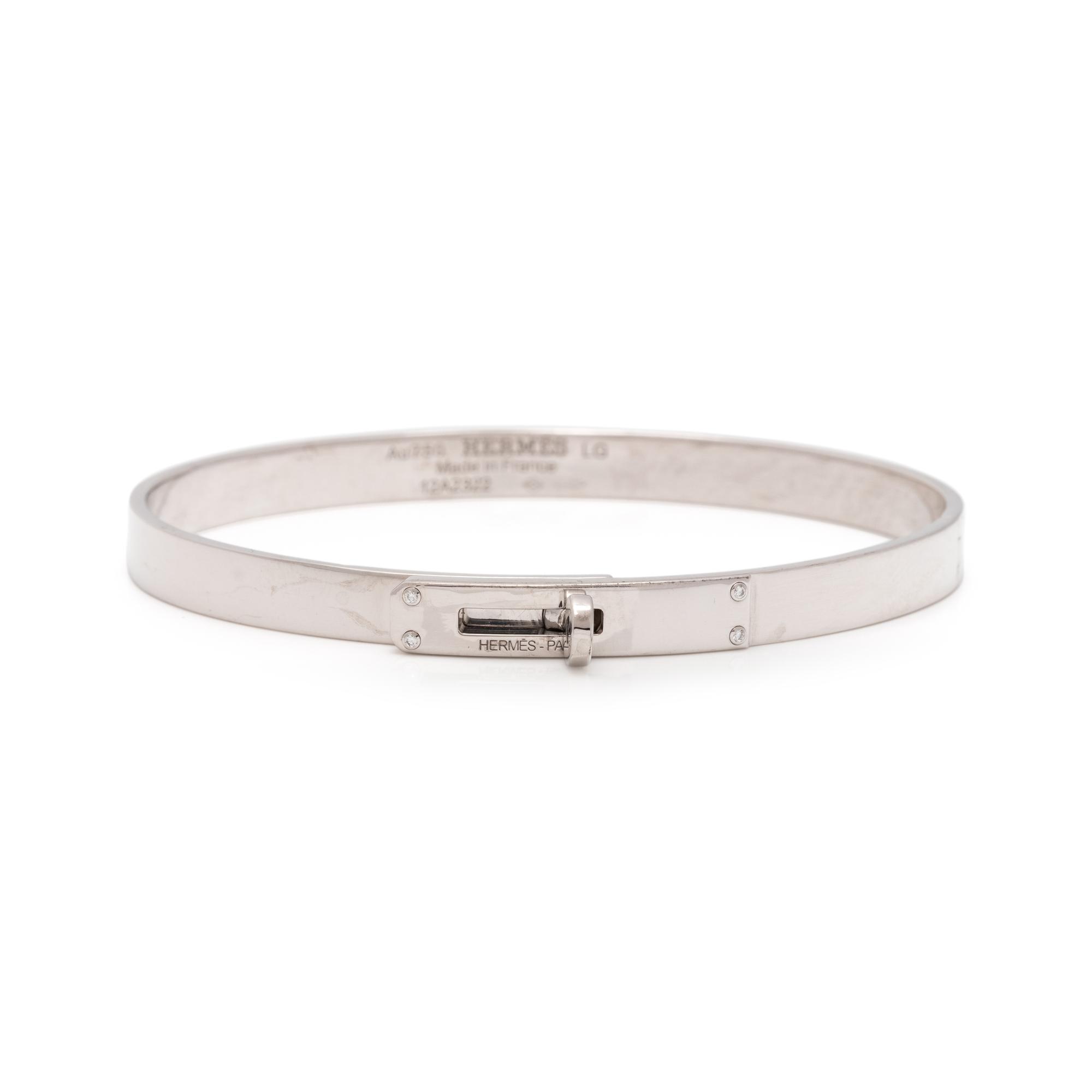 HERMÈS, WHITE GOLD AND DIAMOND 'KELLY' BANGLE BRACELET