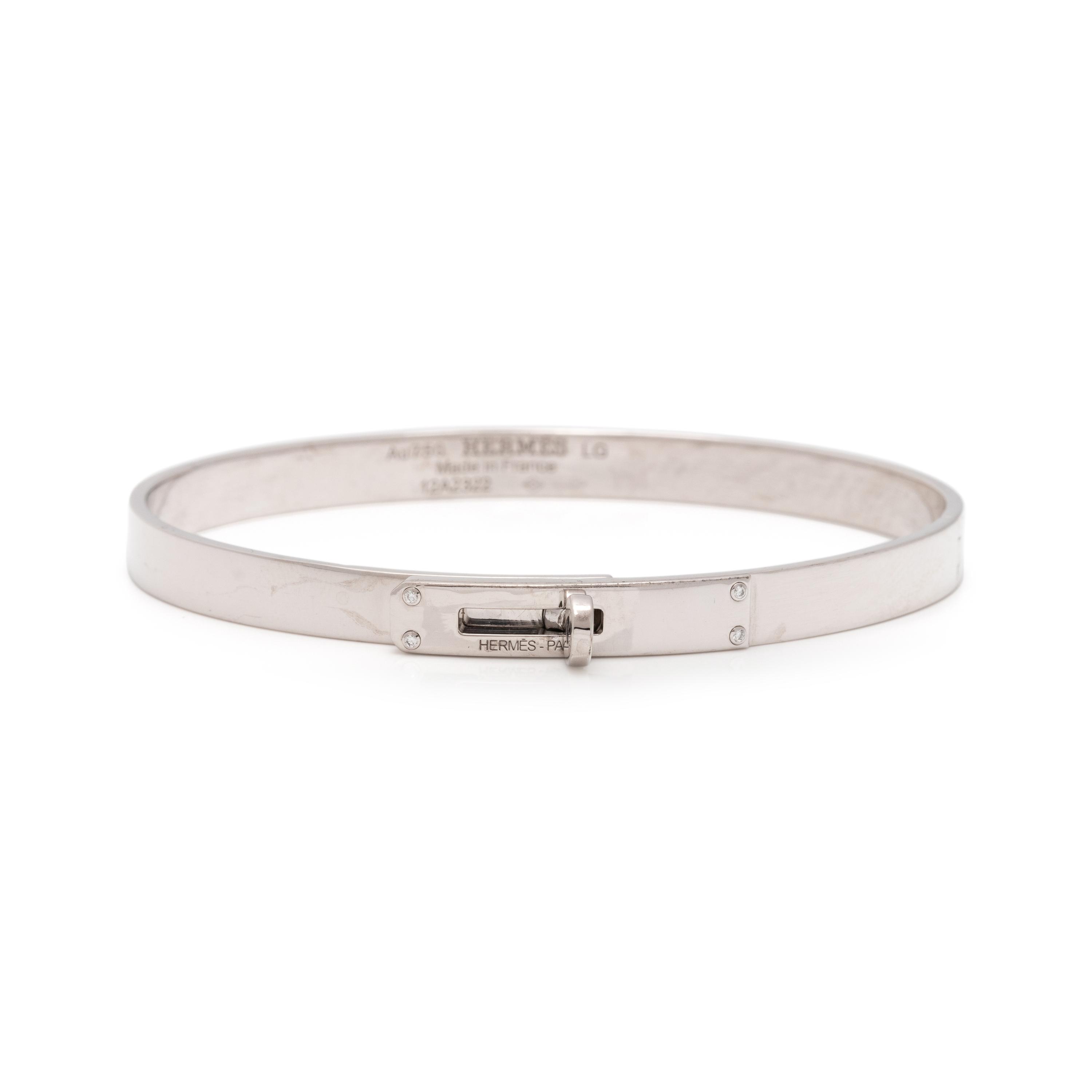 HERMÈS, WHITE GOLD AND DIAMOND 'KELLY' BANGLE BRACELET