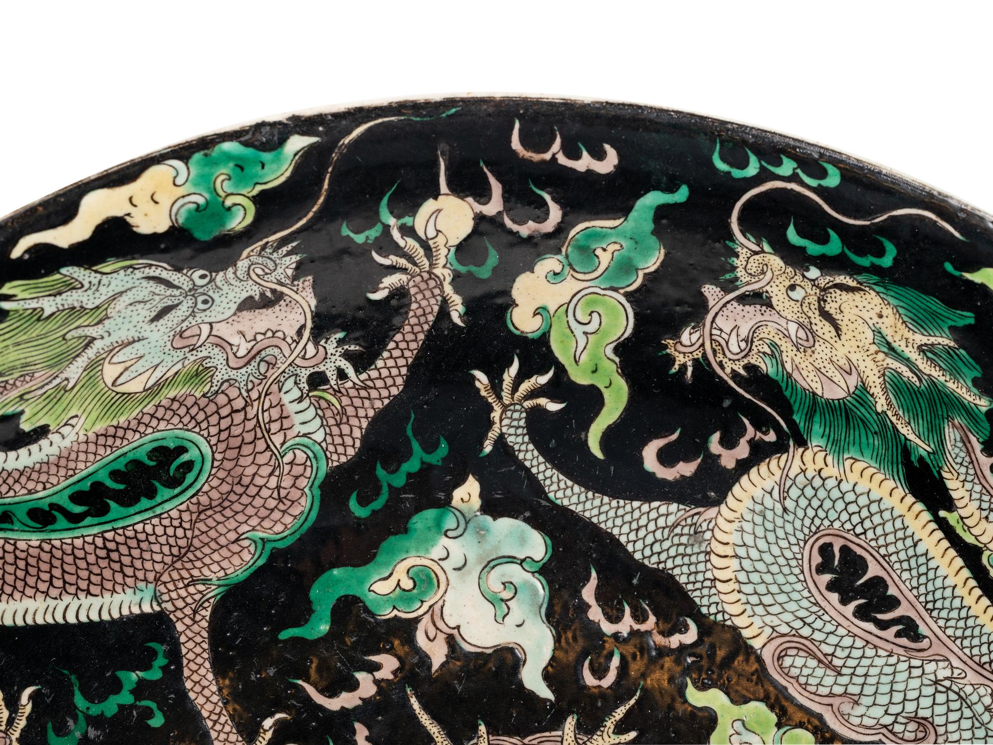 A Large Famille Noire Porcelain 'Dragon' Charger