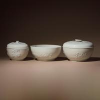 Three Large Chinese Blanc-de-Chine Molded Porcelain Bowls and Two Covers, Late 17th-18th Century — 清早期 德化白瓷模印花卉紋蓋碗三件