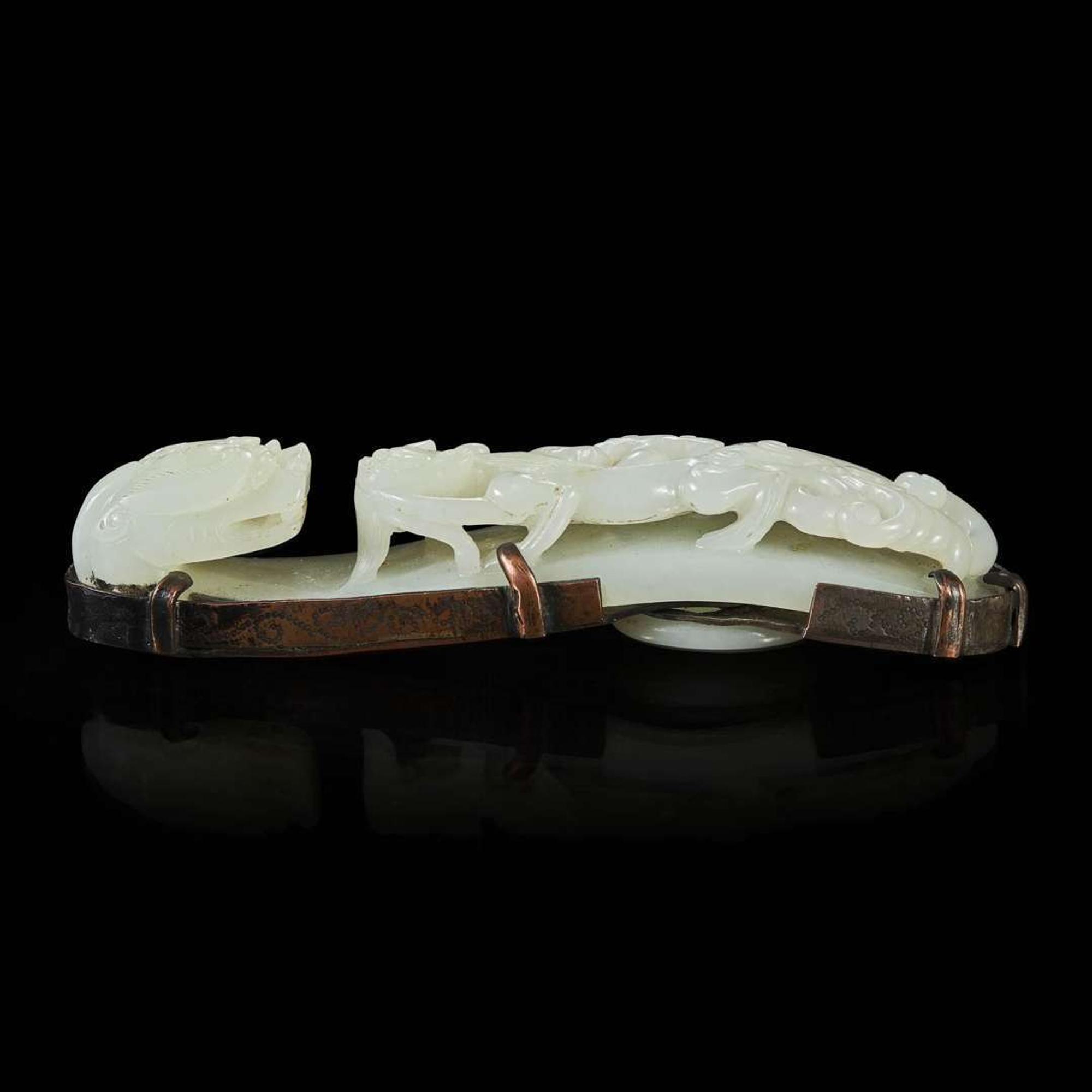 A well-carved Chinese white jade belthook 苍龙教子白玉带钩一件 18th / 19th Century ???????