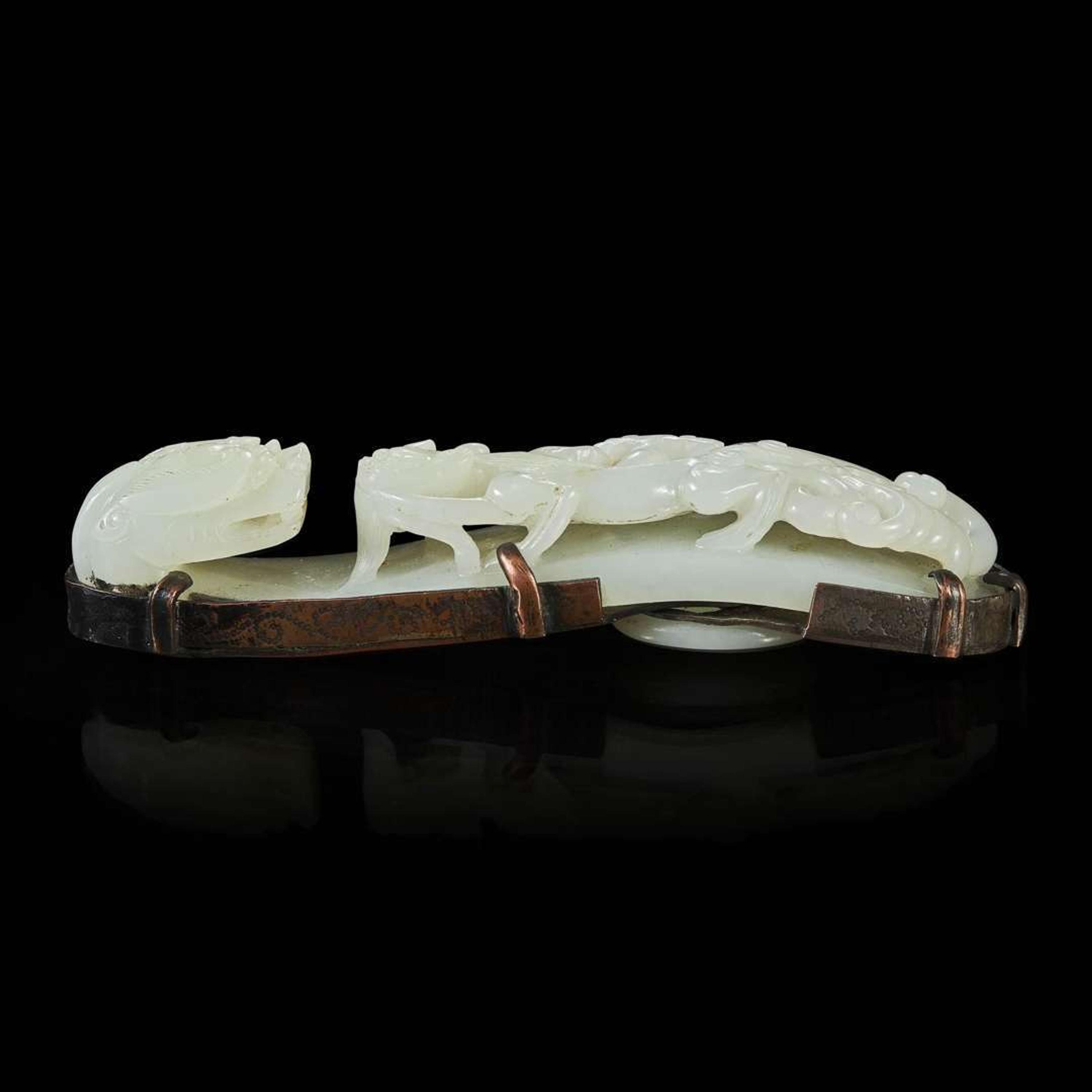 A well-carved Chinese white jade belthook 苍龙教子白玉带钩一件 18th / 19th Century ???????