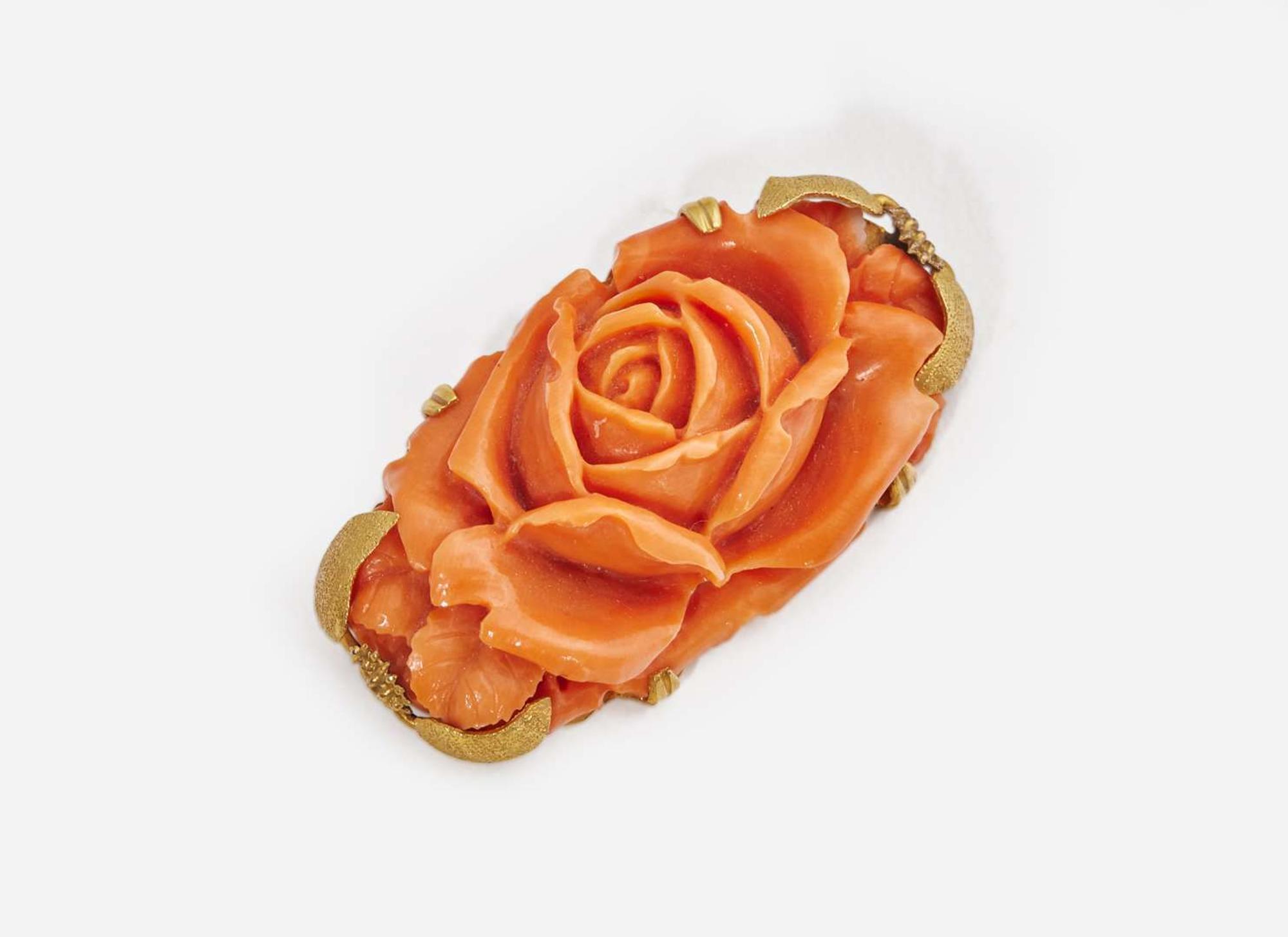 A Collection of Yellow Gold and Coral Jewelry