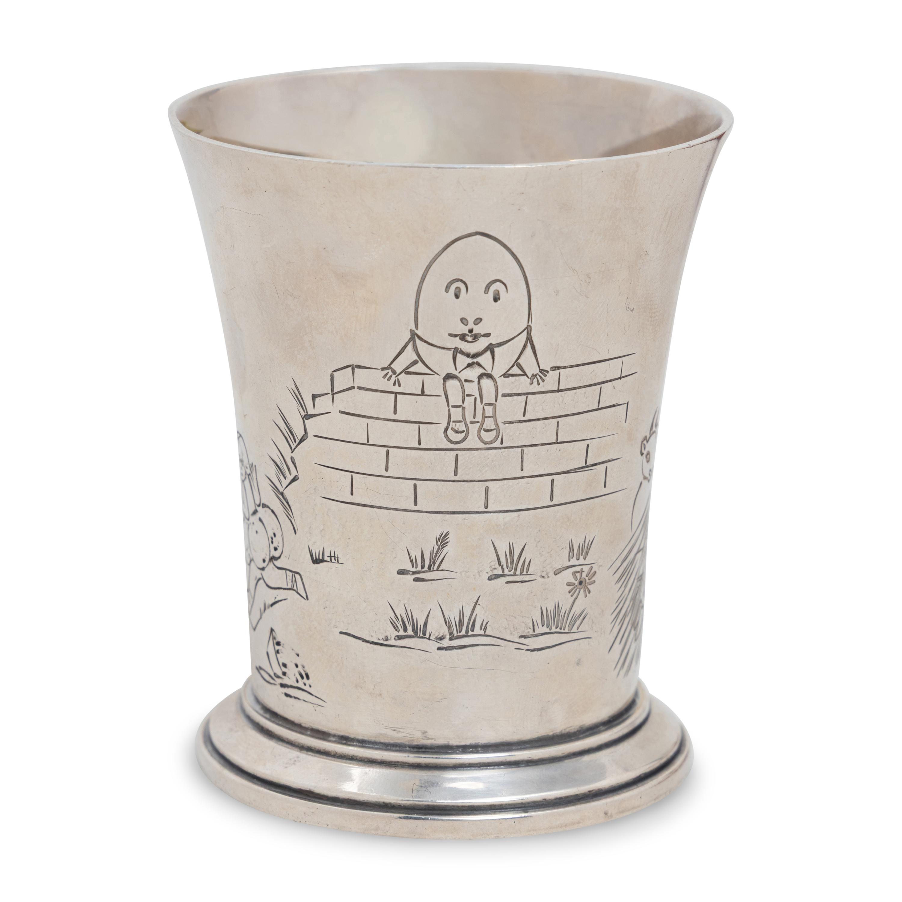An English Silver Child's Cutlery Set and Cup