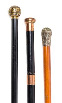 Three Knop Handled Canes Length of longest 36 1/4 inches.
