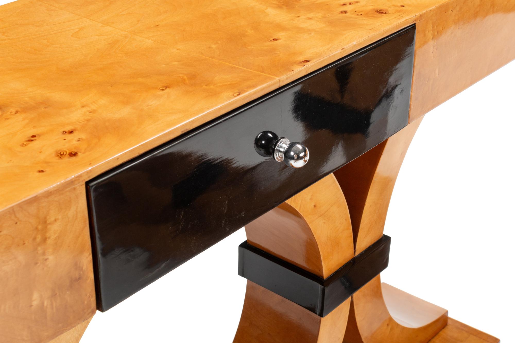 A Pair of Art Moderne Style Part Ebonized Birch Console Tables