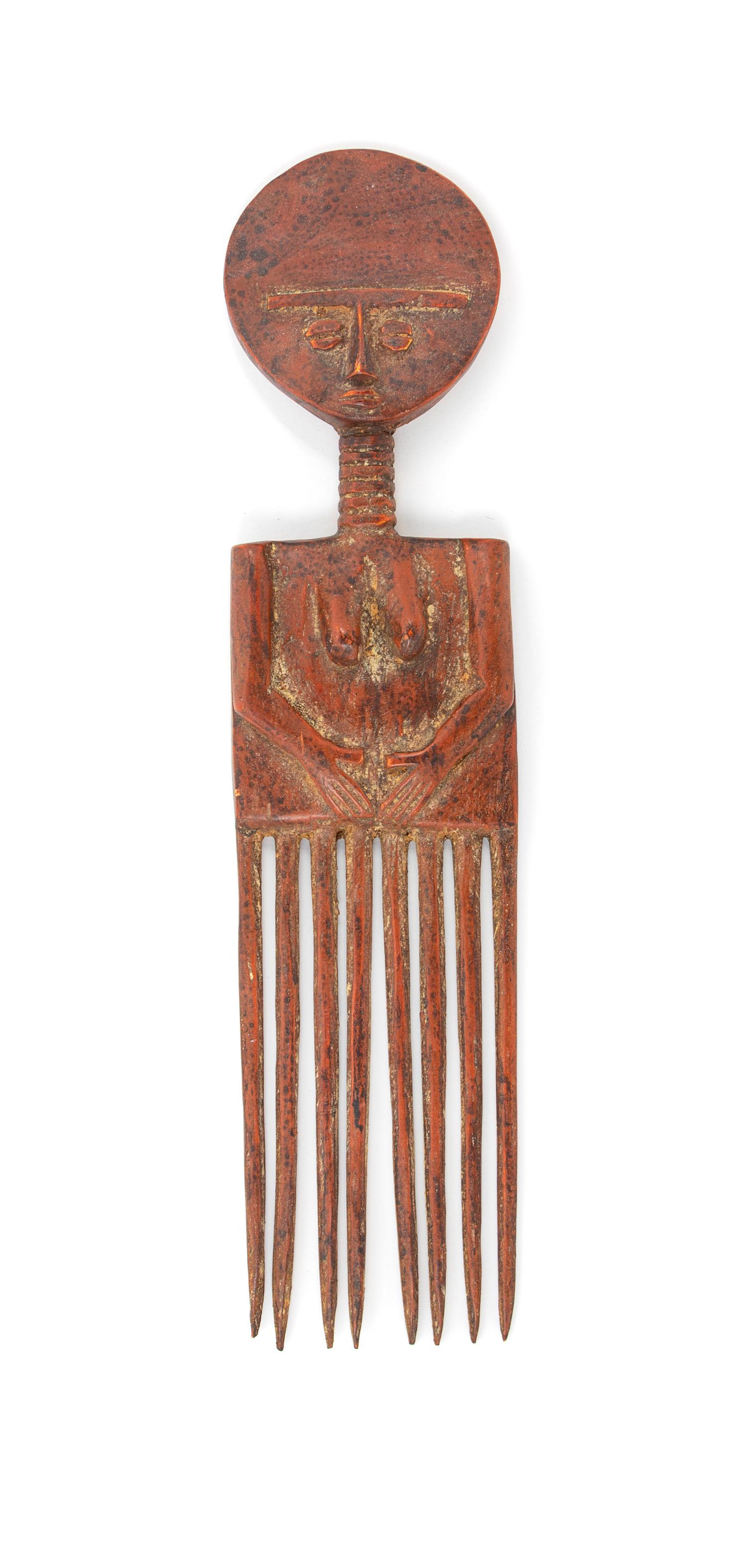 An Ashanti Female Figural Comb Height 14 1/2 inches. — 20TH CENTURY