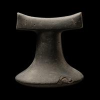 A Polynesian Black-Basalt Poi Pounder