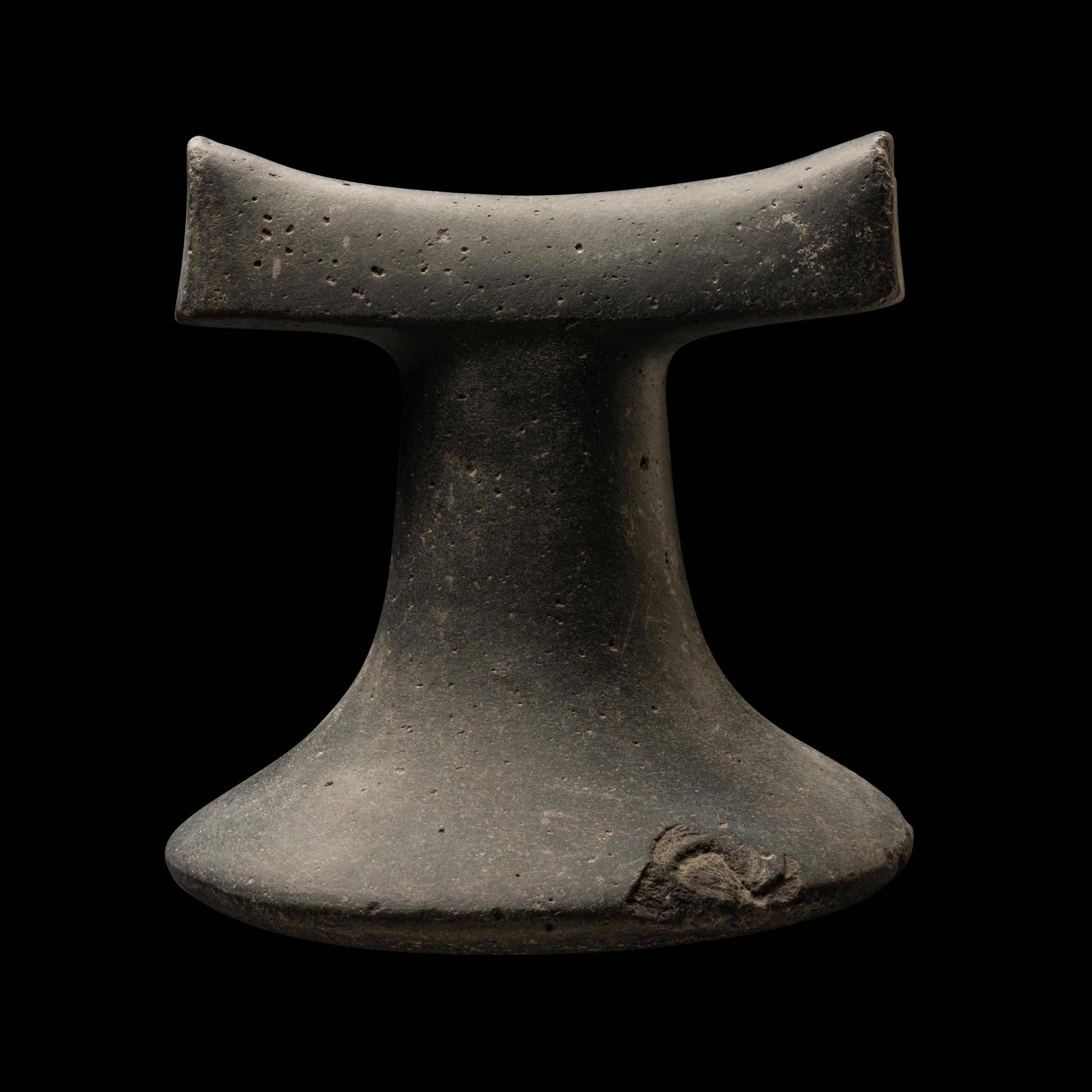 A Polynesian Black-Basalt Poi Pounder