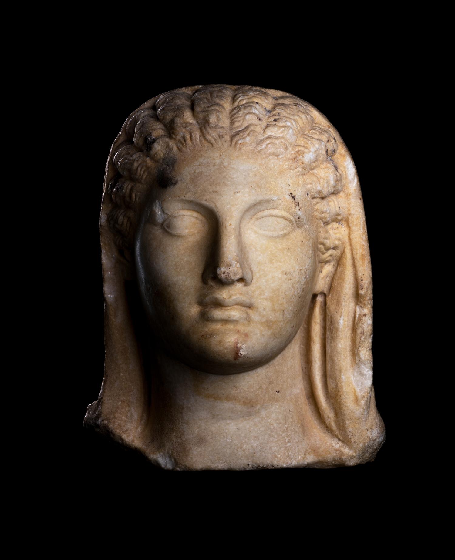A Roman Marble Portrait Head of a Veiled Woman