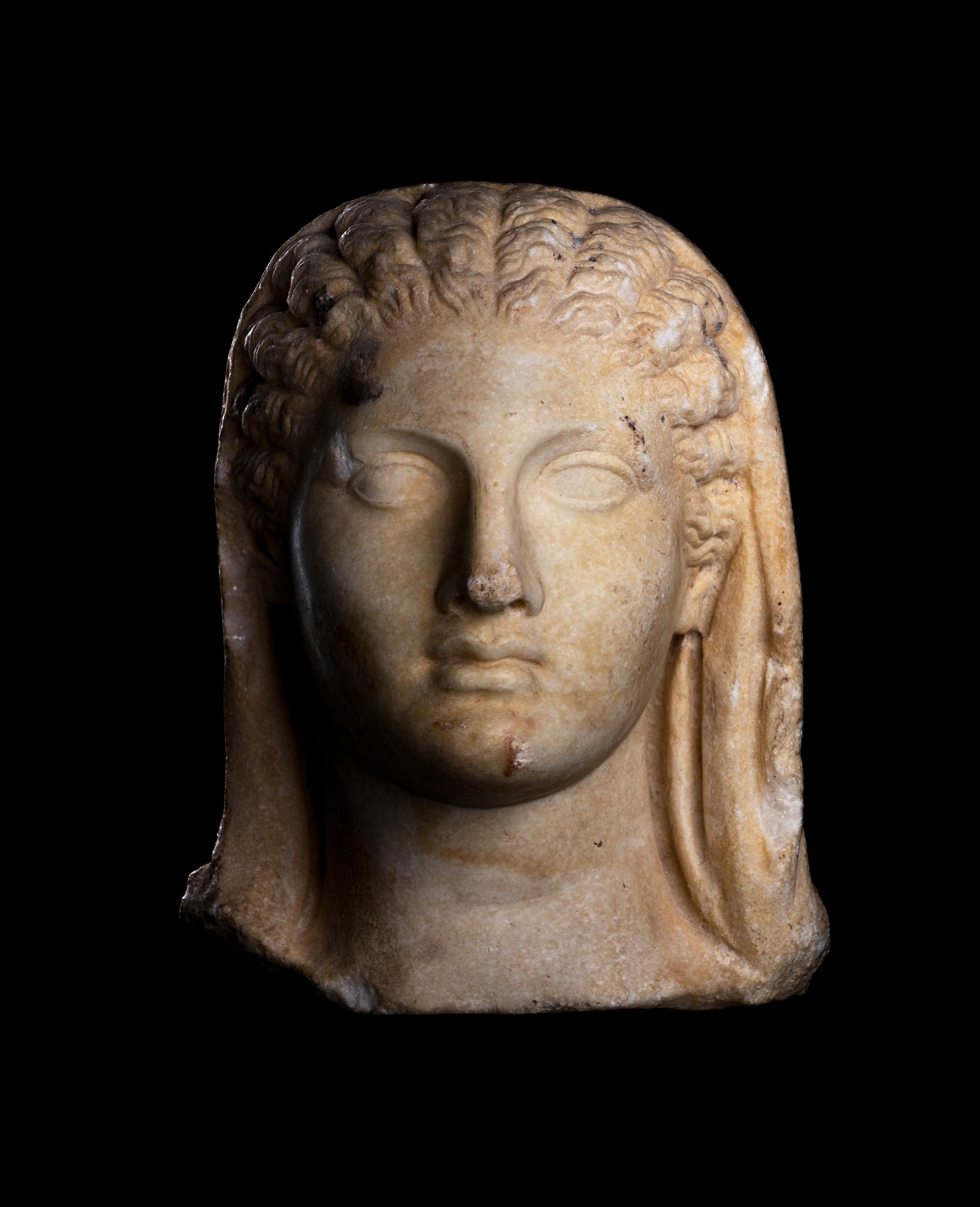 A Roman Marble Portrait Head of a Veiled Woman