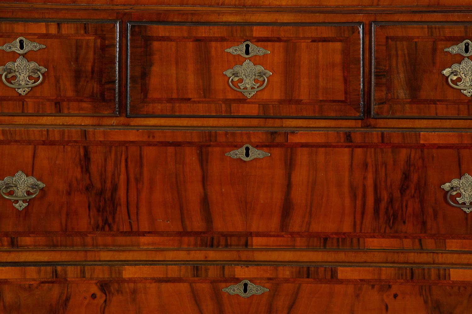 A Queen Anne Figured Mahogany Chest on Stand