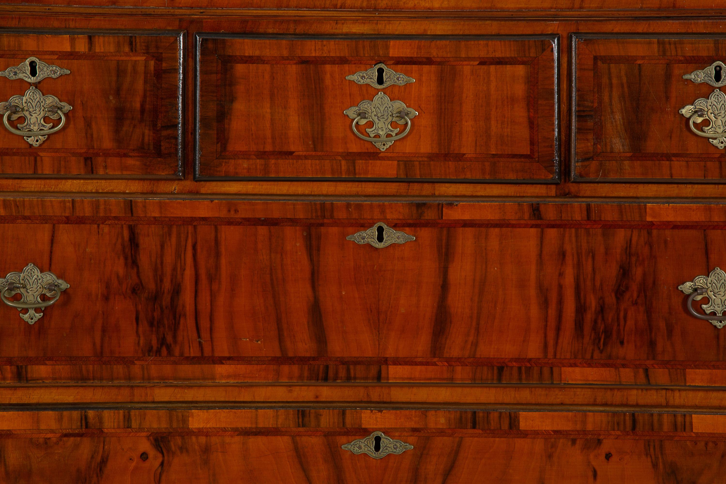 A Queen Anne Figured Mahogany Chest on Stand