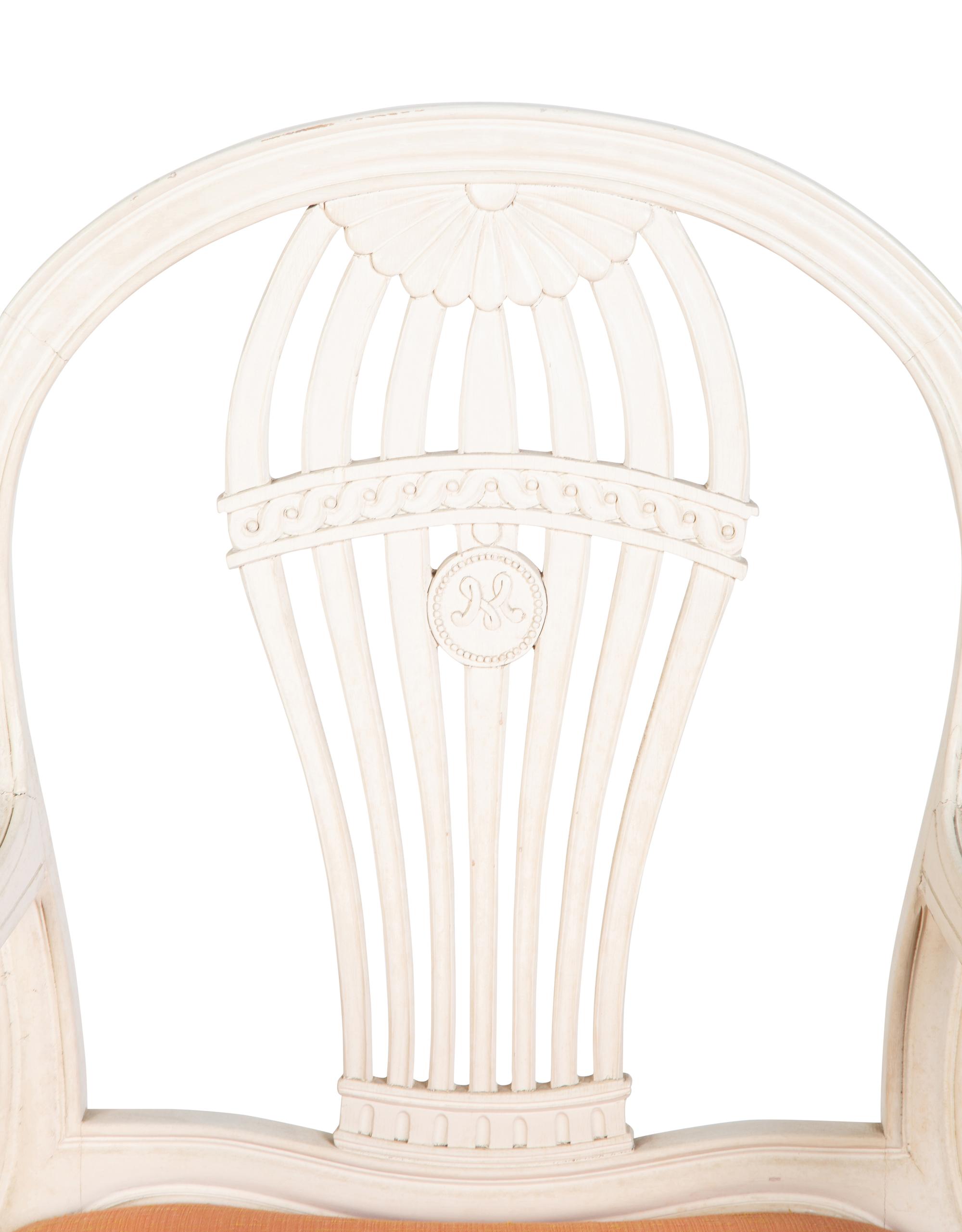 A Pair of Carved and Painted Wood Montgolfière Fauteuils — 20TH CENTURY