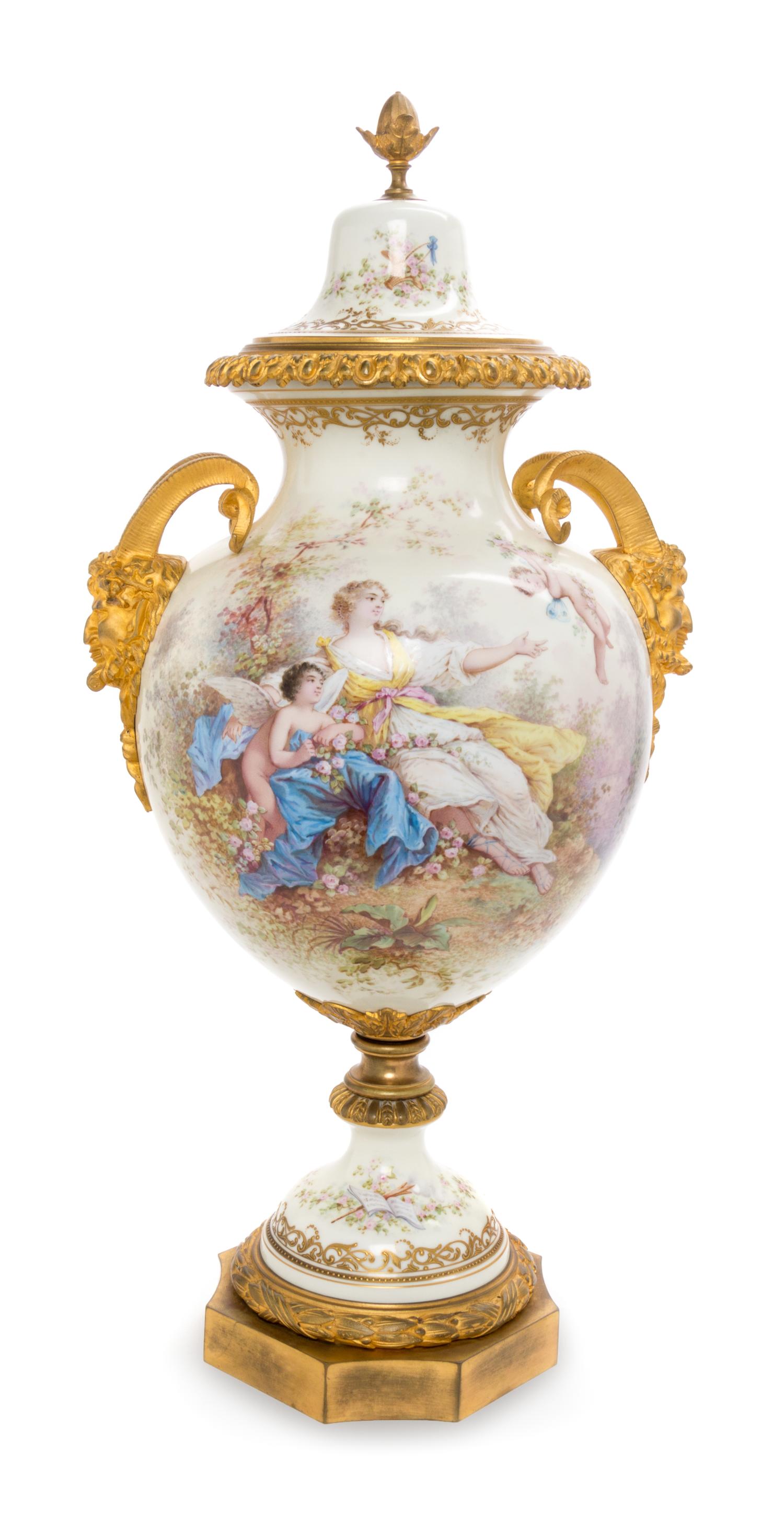 A Sevres Style Gilt Bronze Mounted Porcelain Urn Height 25 inches. — 19TH CENTURY