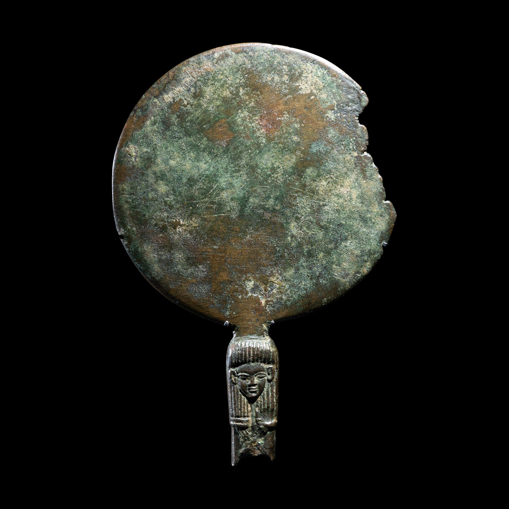 An Egyptian Bronze Mirror