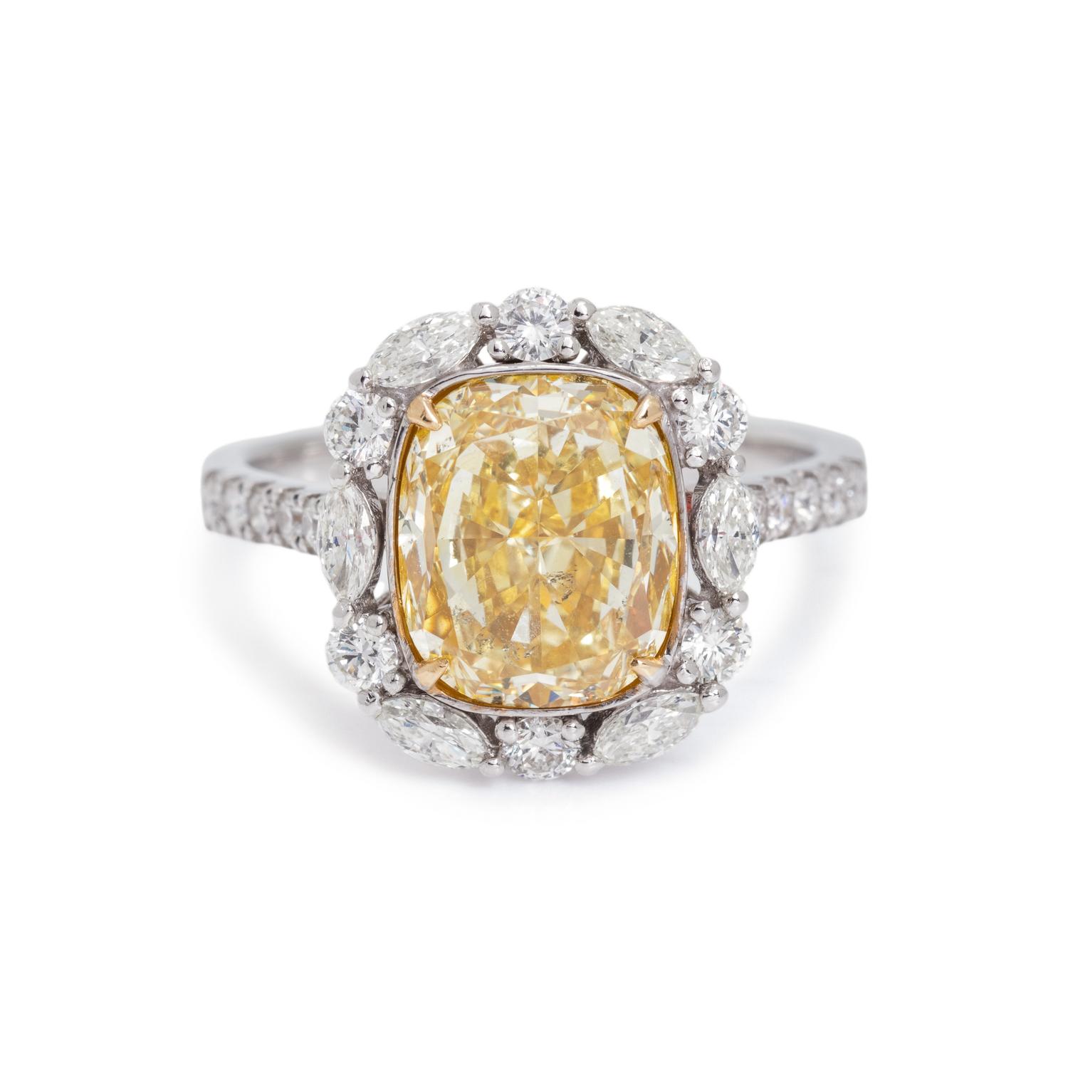 FANCY YELLOW DIAMOND AND DIAMOND RING